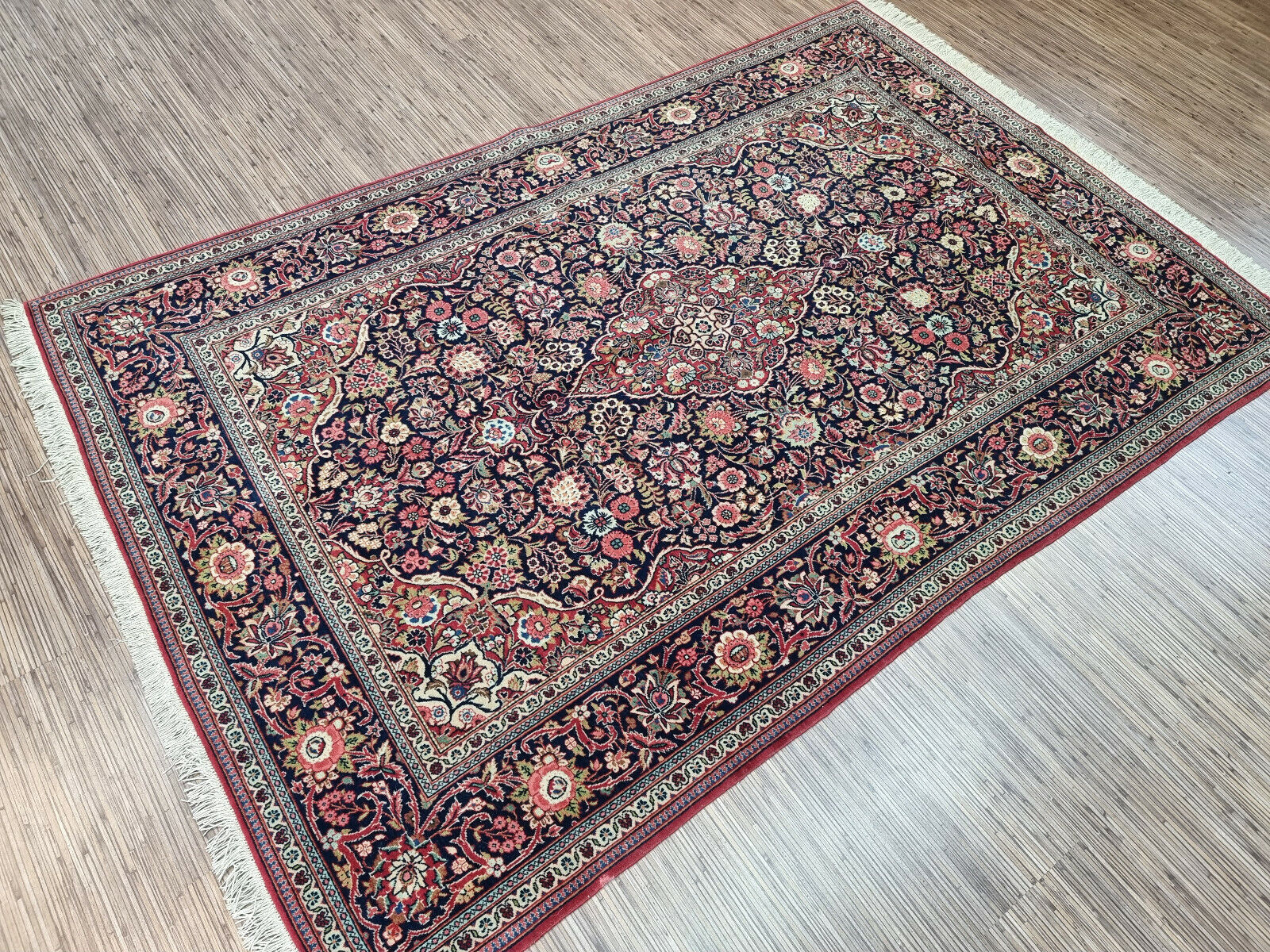 Close-up of wool texture on Handmade Antique Persian Kashan Rug - Detailed view showcasing the wool texture known for its durability and comfort.