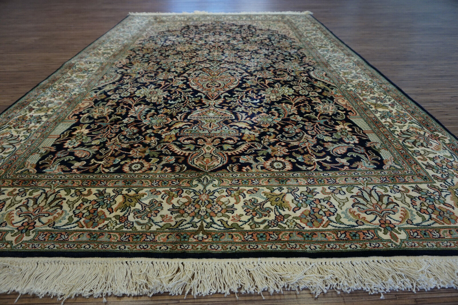 Artistic display of the Handmade Vintage Persian Kashmir Rug as a statement piece