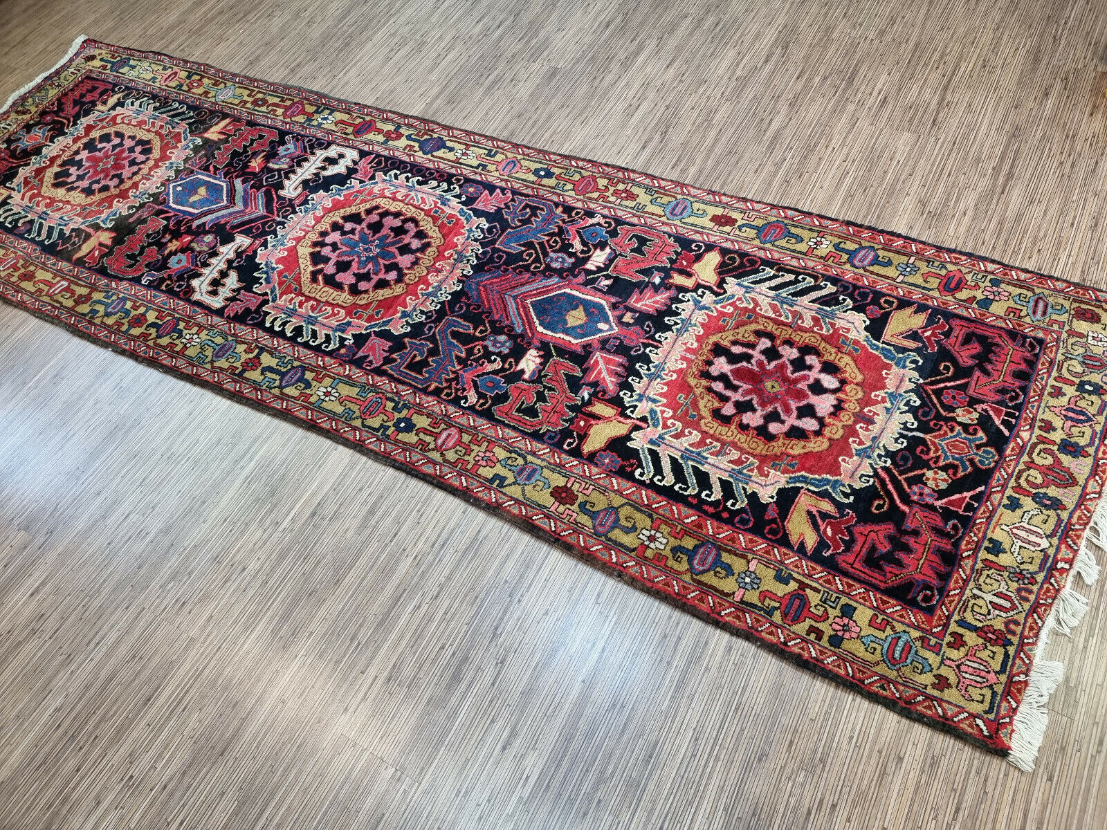 Close-up of sophistication on Handmade Antique Persian Heriz Runner Rug - Detailed view showcasing the rug's sophistication and timeless elegance.