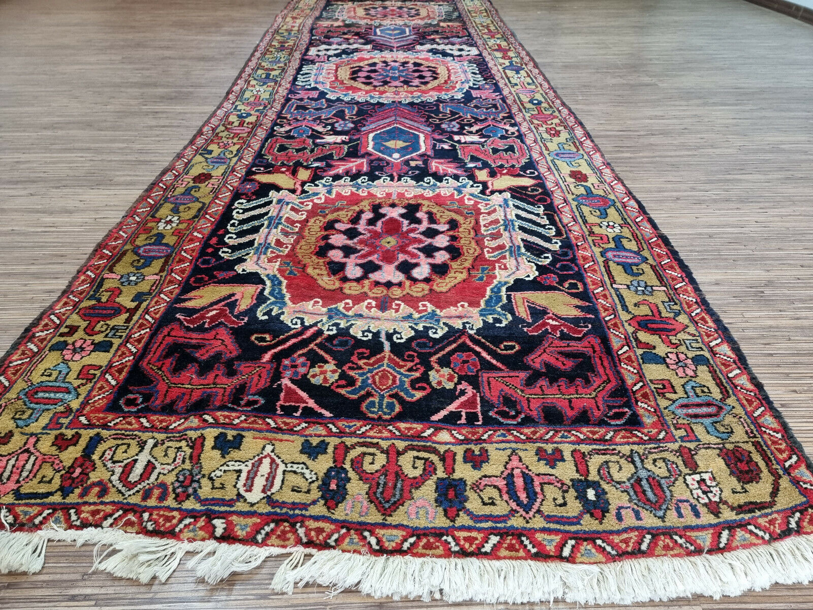 Close-up of charm on Handmade Antique Persian Heriz Runner Rug - Detailed view highlighting the rug's charm and visual allure.
