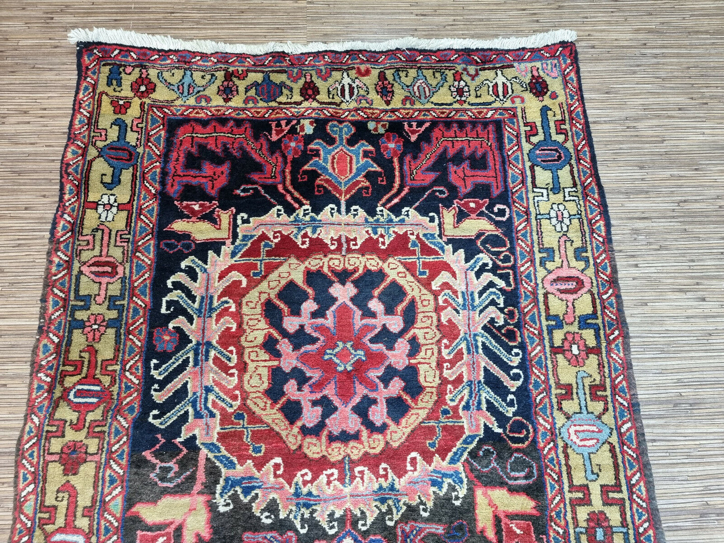 Close-up of warmth and coziness on Handmade Antique Persian Heriz Runner Rug - Detailed view emphasizing the warmth and coziness provided by the wool texture.