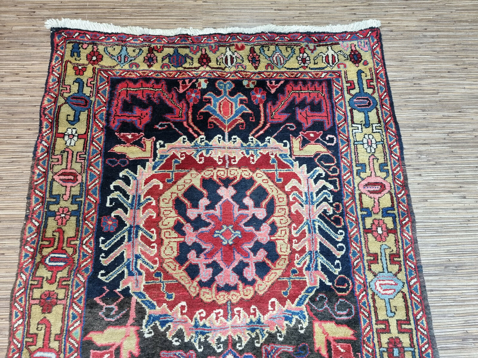 Close-up of warmth and coziness on Handmade Antique Persian Heriz Runner Rug - Detailed view emphasizing the warmth and coziness provided by the wool texture.