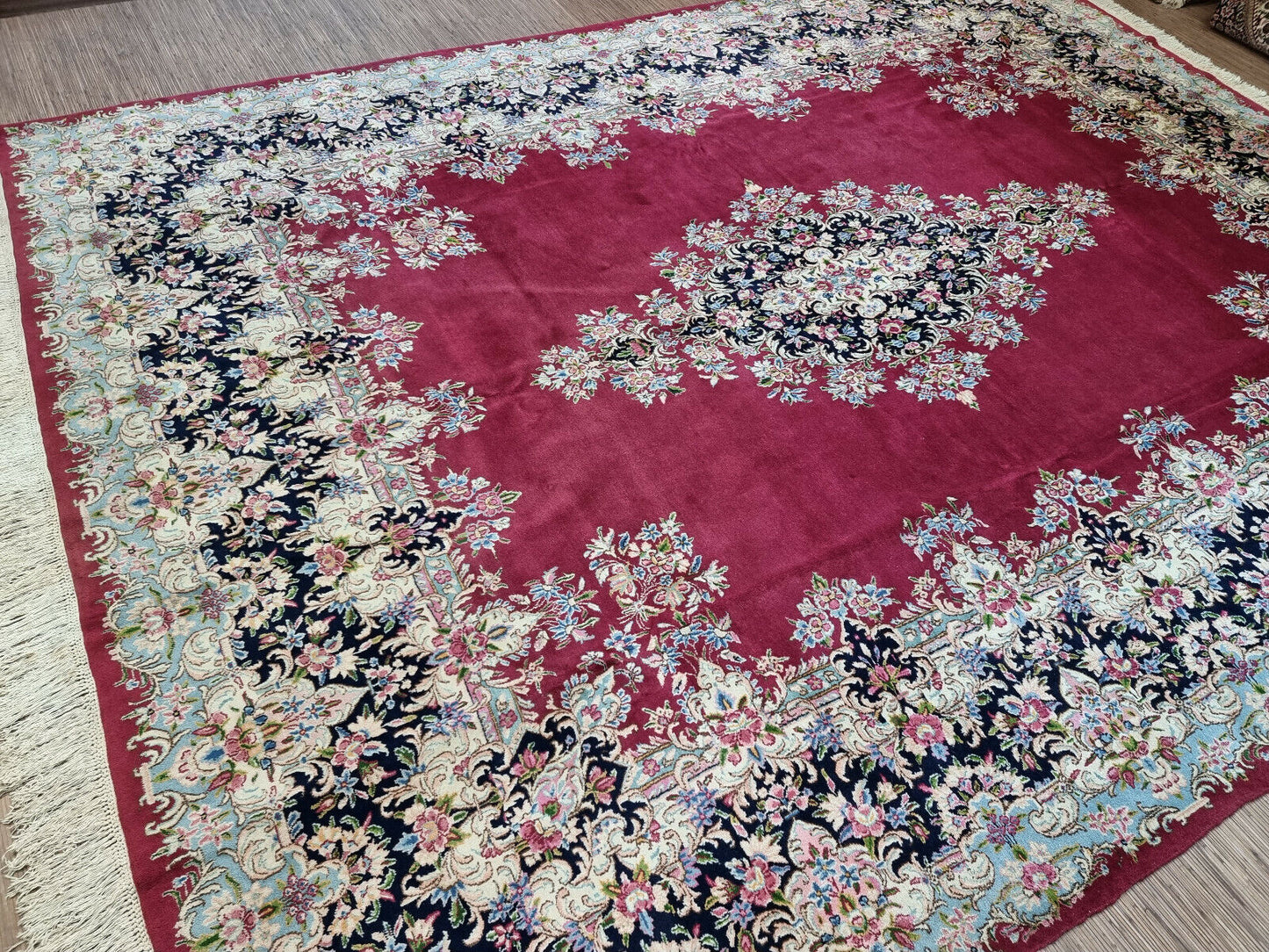 Close-up of vintage elegance on Handmade Vintage Persian Kerman Rug - Detailed view showcasing the vintage elegance and charm of the rug.