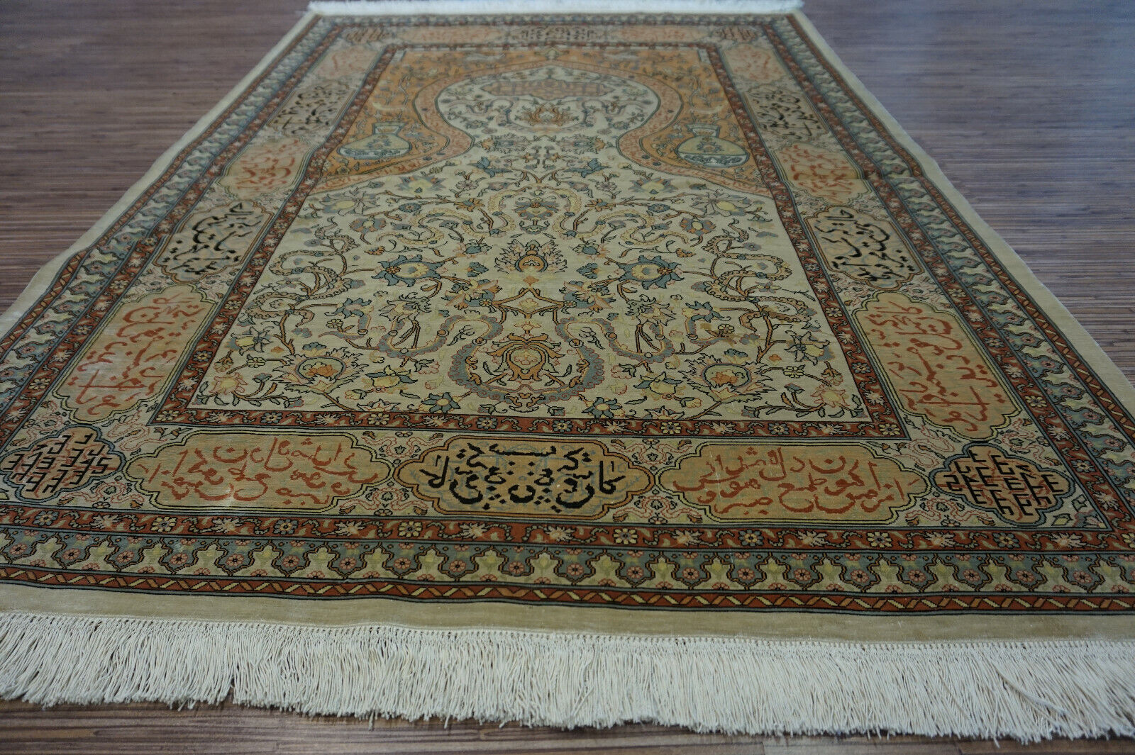 Angled shot of the Handmade Vintage Turkish Hereke Silk Rug complementing furniture