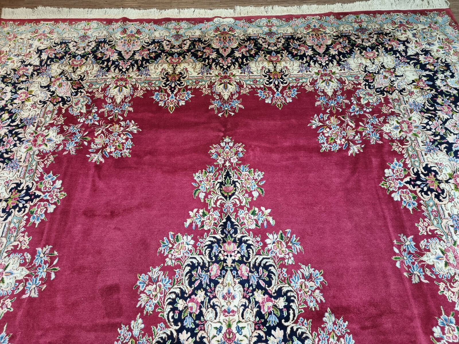 Close-up of Persian rug-making techniques on Handmade Vintage Persian Kerman Rug - Detailed view showcasing the traditional rug-making techniques used in creating the rug.