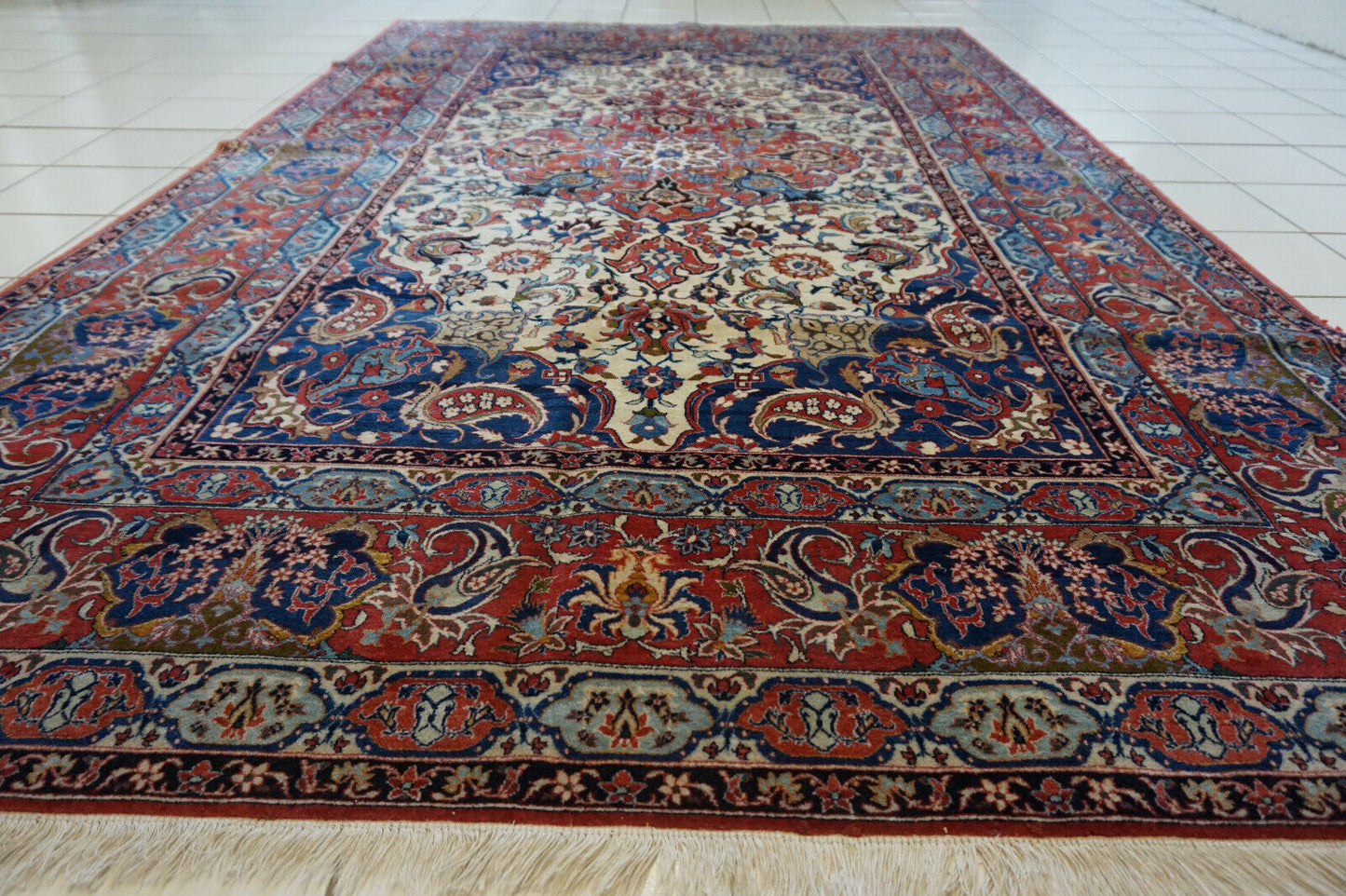 Artistic display of the Handmade Antique Persian Style Isfahan Rug as a room centerpiece