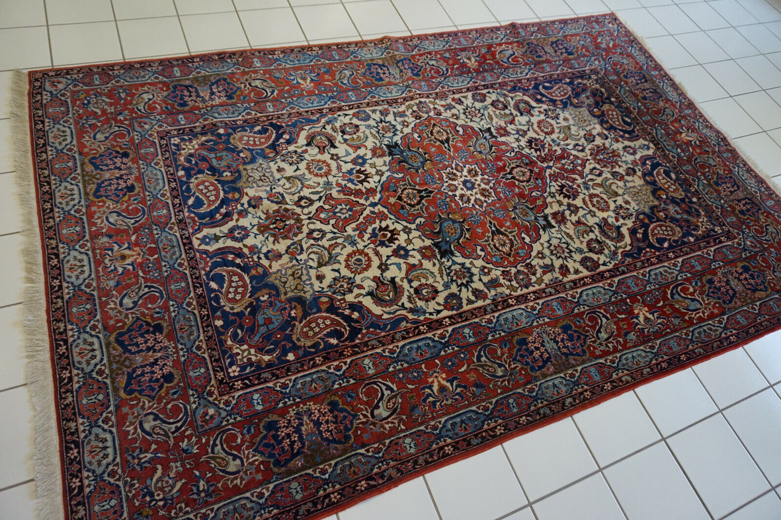 Angled shot of the Handmade Antique Persian Style Isfahan Rug complementing furniture