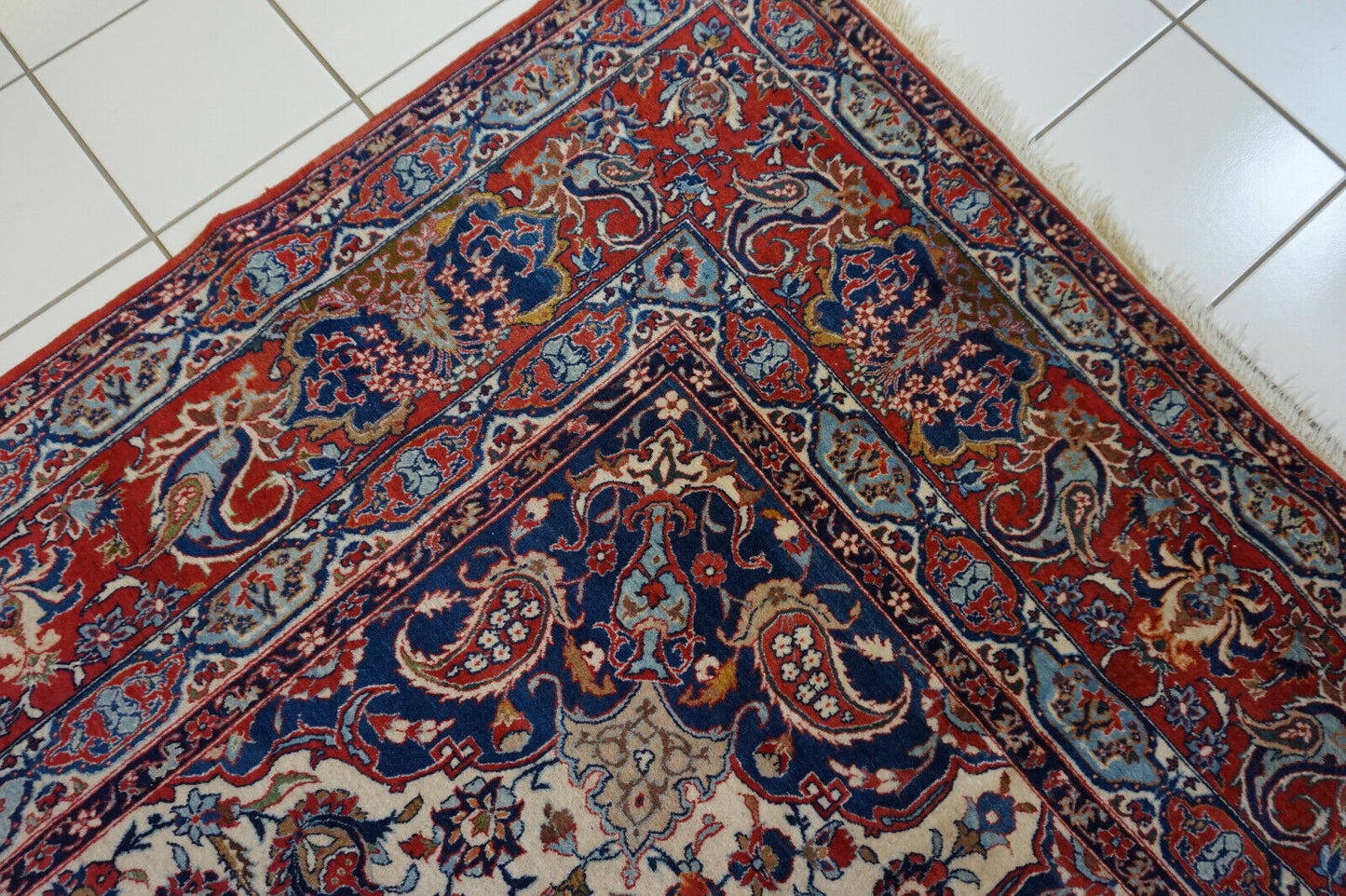 Close-up of the deep red hues on the Handmade Antique Persian Style Isfahan Rug