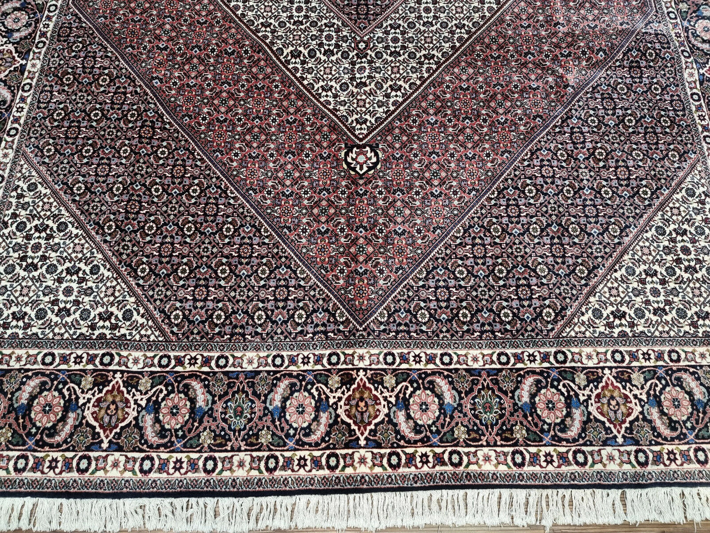 Close-up of geometric patterns on Handmade Vintage Persian Bidjar Rug - Detailed view highlighting the geometric designs integrated into the rug's borders.