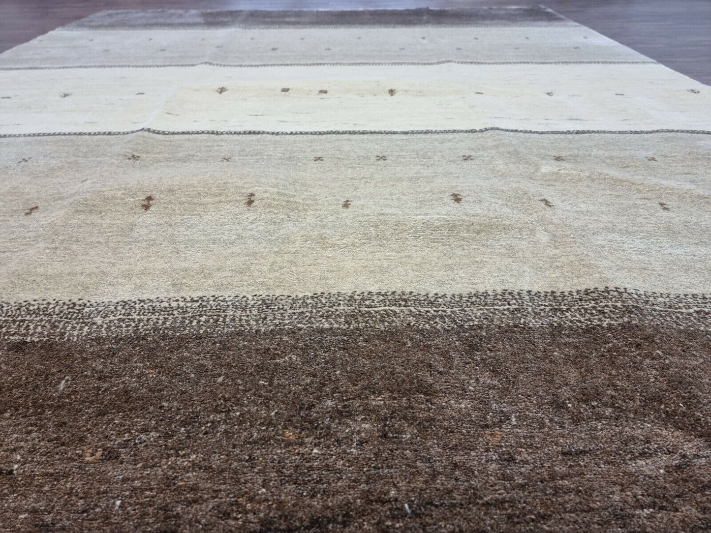 Side view of the Handmade Vintage Persian Style Gabbeh Rug demonstrating its thick woolen texture