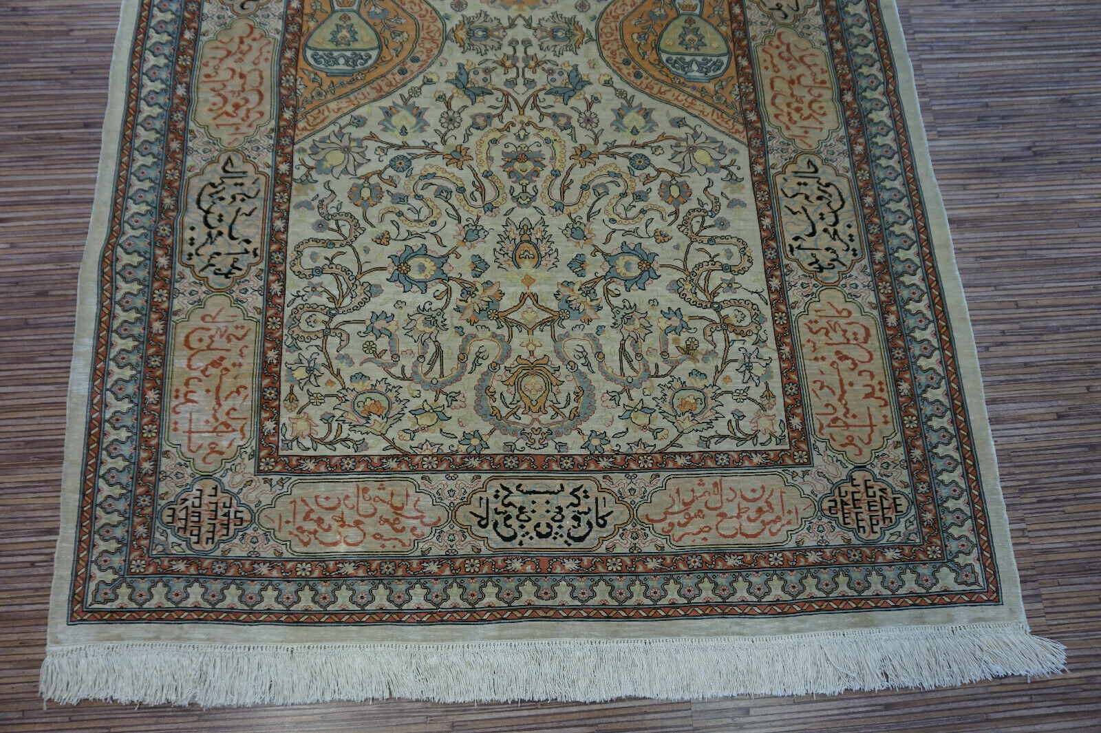 Side view of the Handmade Vintage Turkish Hereke Silk Rug demonstrating texture