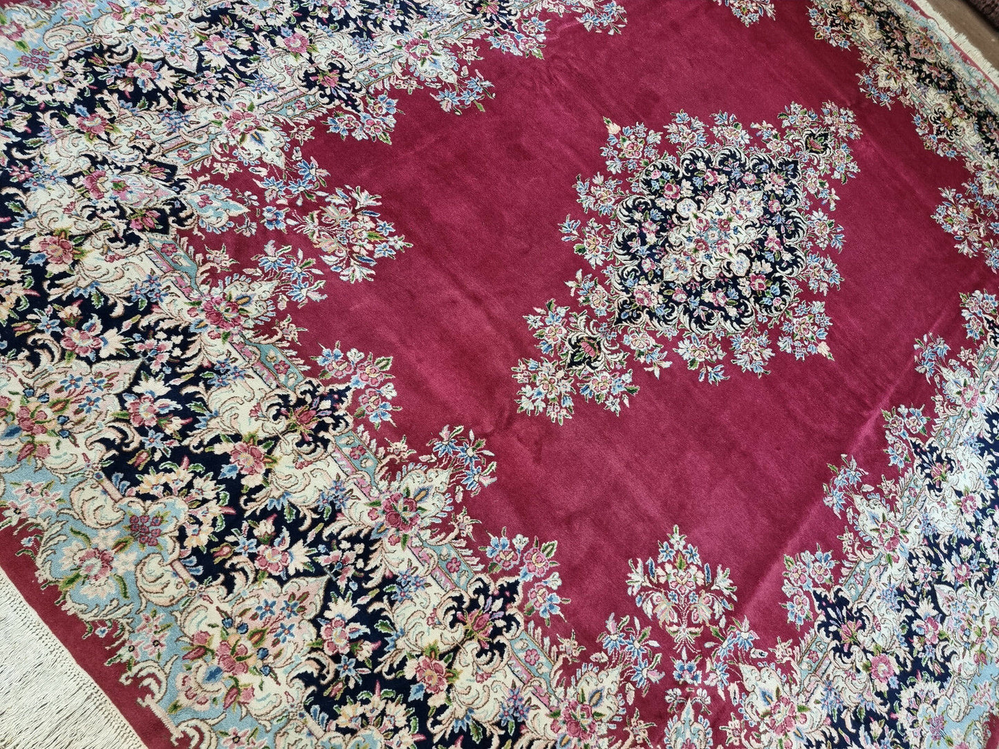 Close-up of cozy and inviting texture on Handmade Vintage Persian Kerman Rug - Detailed view showcasing the cozy and inviting texture of the rug.