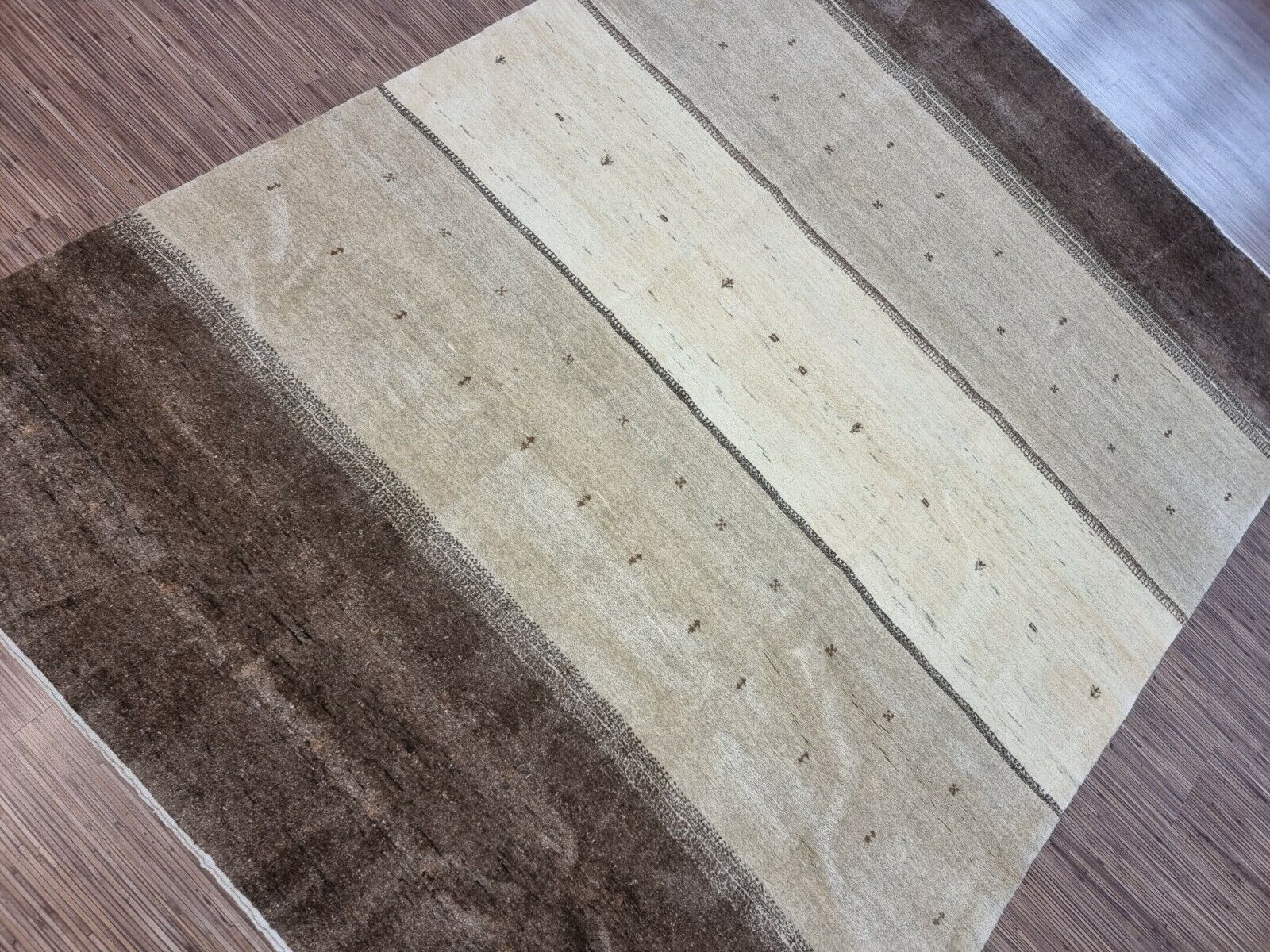 Side angle shot of the Handmade Vintage Persian Style Gabbeh Rug showcasing size and scale