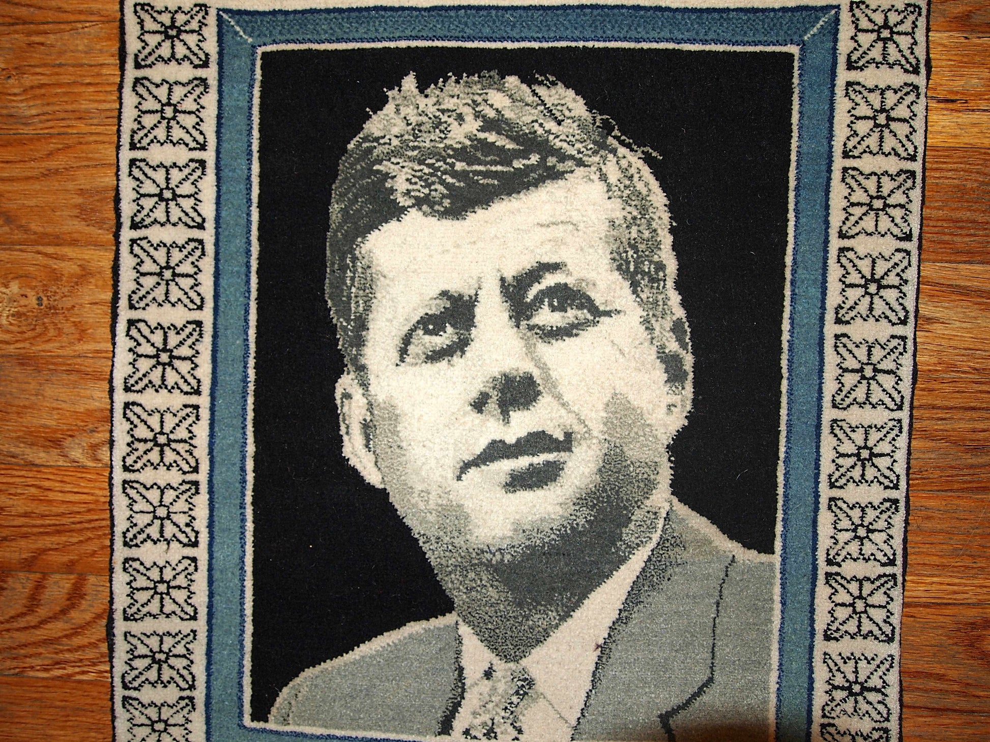 This vintage Persian Tabriz rug illustrates portrait of J.F. Kennedy. Tabriz rugs are one of the best type of Persian carpets. 
