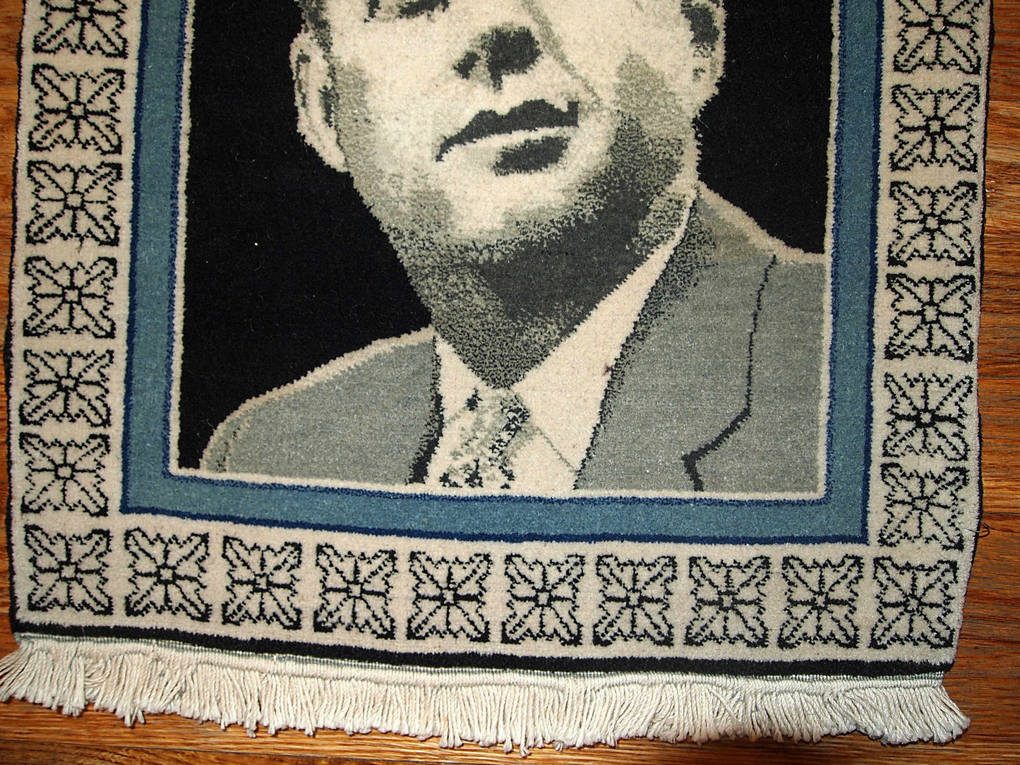 This vintage Persian Tabriz rug illustrates portrait of J.F. Kennedy. Tabriz rugs are one of the best type of Persian carpets. 