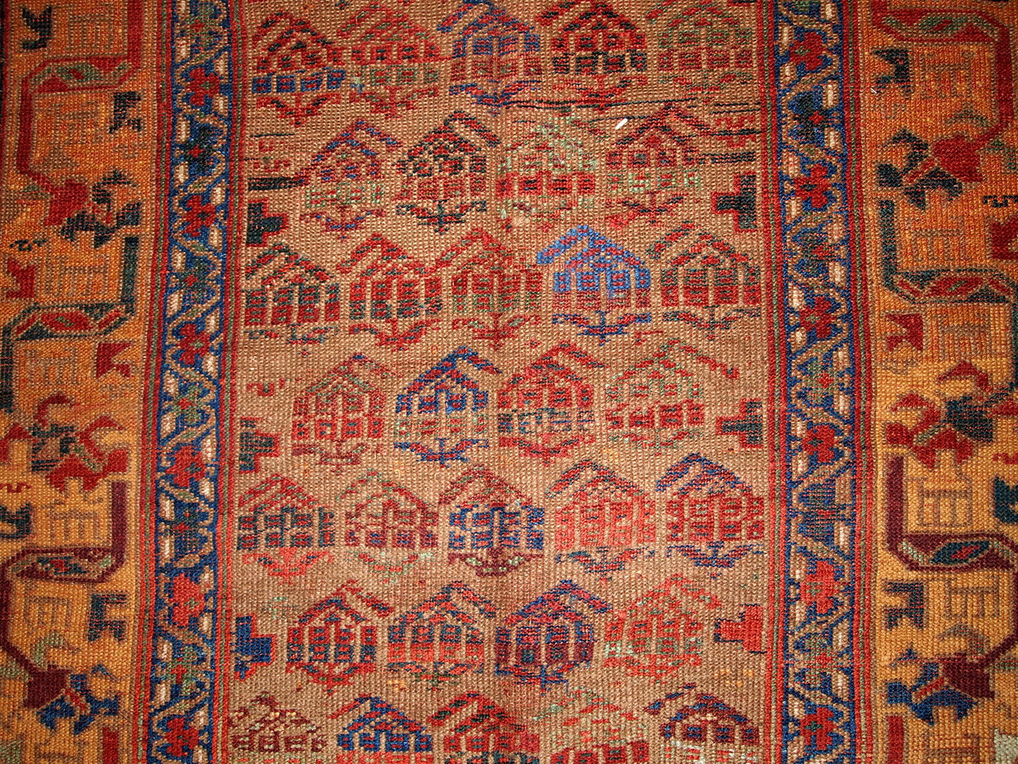 Antique Persian Kurdish rug in traditional design, olive green and yellow shades. The rug is from the end of 19th century, in good condition