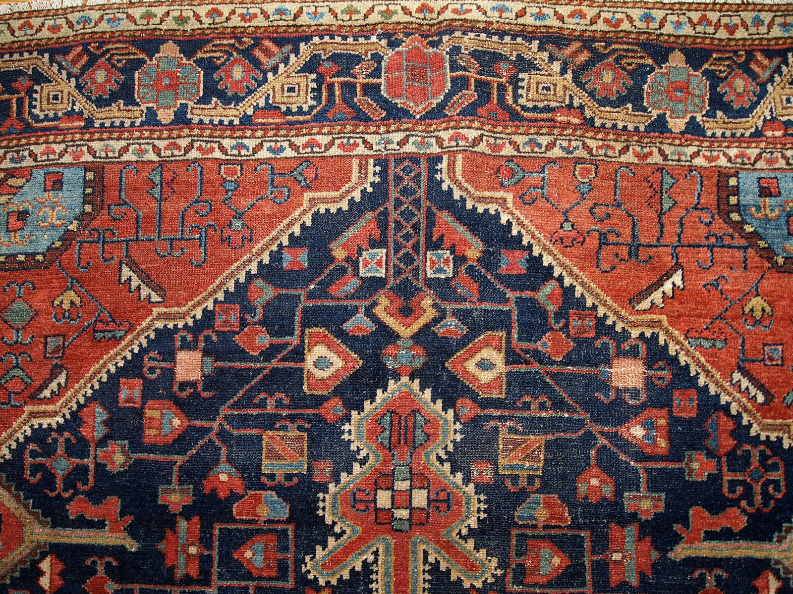 Antique handmade Malayer rug in navy blue and red shades. This rug is in original good condition.