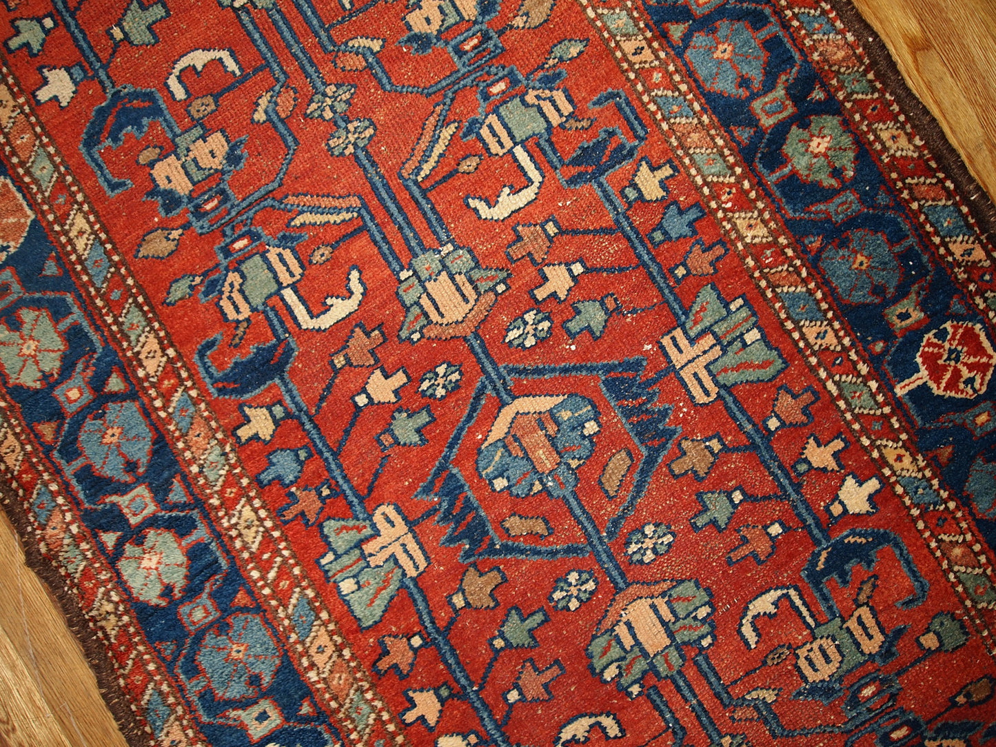 Antique Persian Lilihan rug in red and blue colors. this runner is from the beginning of 20th century in original god condition.