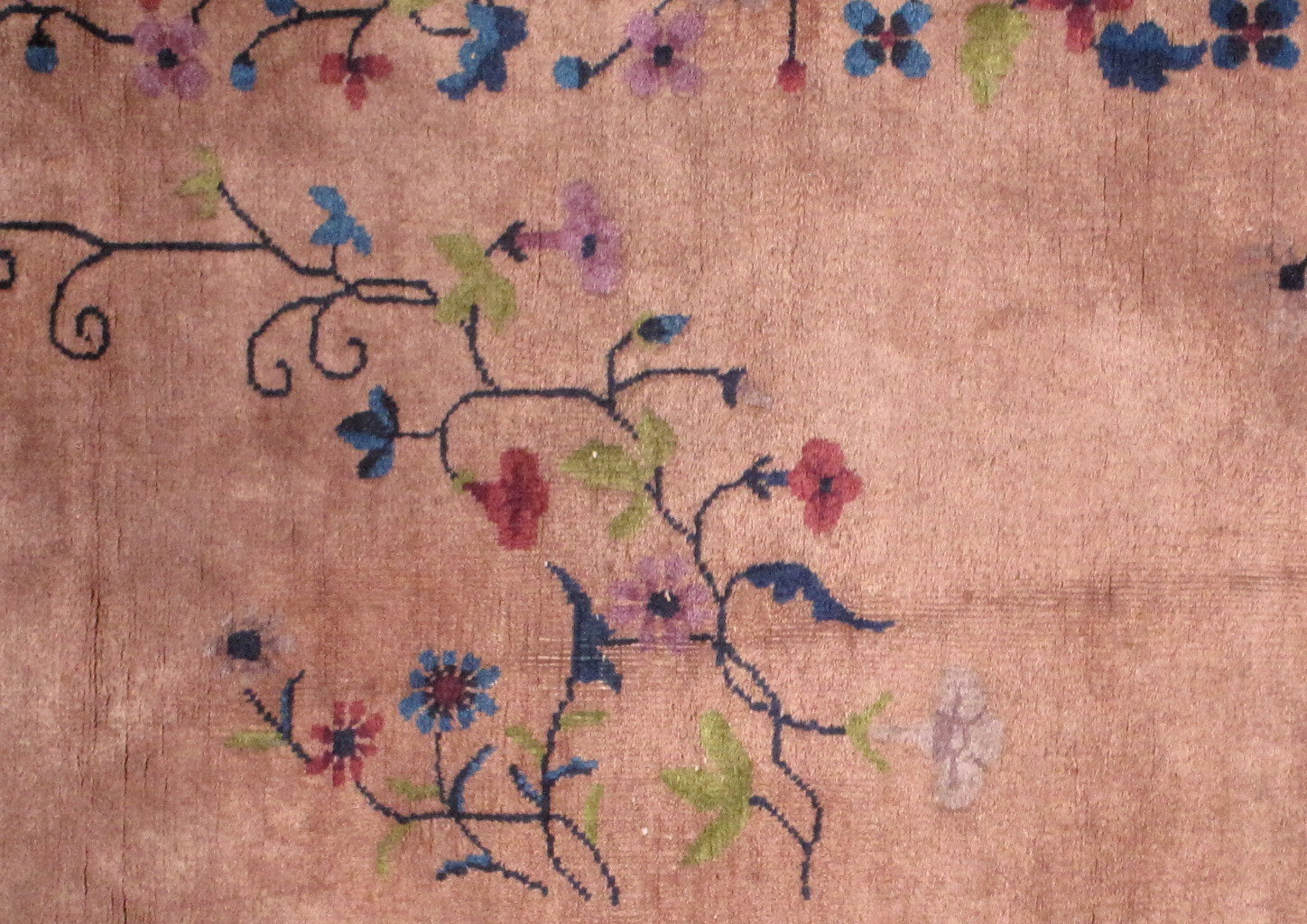 Art Deco Chinese rug in original good condition from the beginning of 20th century. This rug made in different shades of burgundy color and it is in floral design.