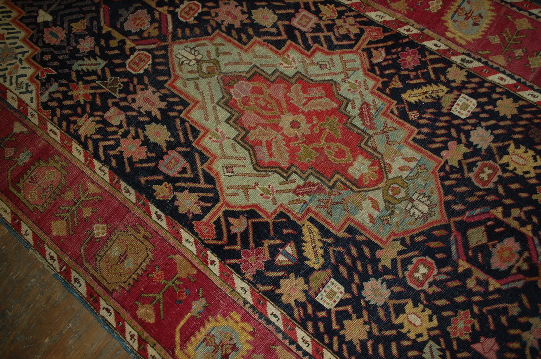 Antique hand made Armenian Karabagh rug in good condition. The rug has been made in the end of 19th century in black and pink wool.