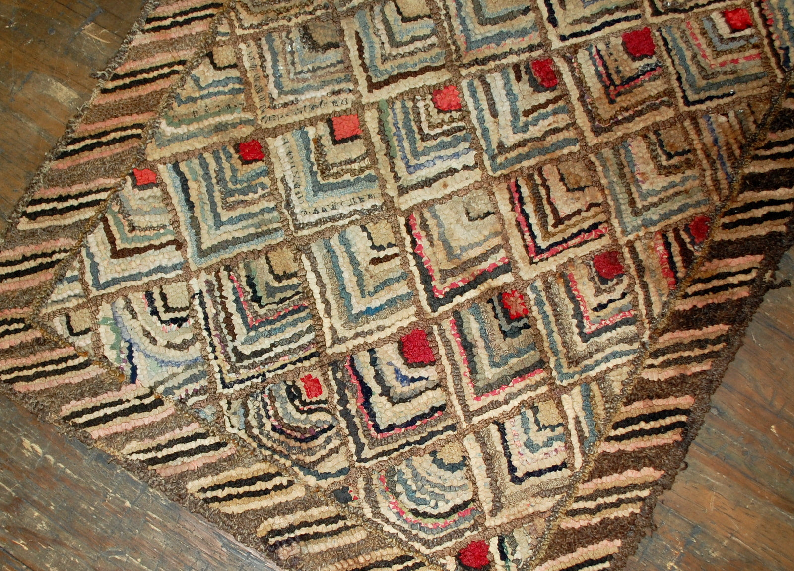 Hand made antique geometric American hooked rug in original good condition. The rug made in geometric design in the beginning of 20th century.