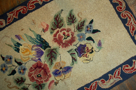 Handmade antique American hooked rug 1900s