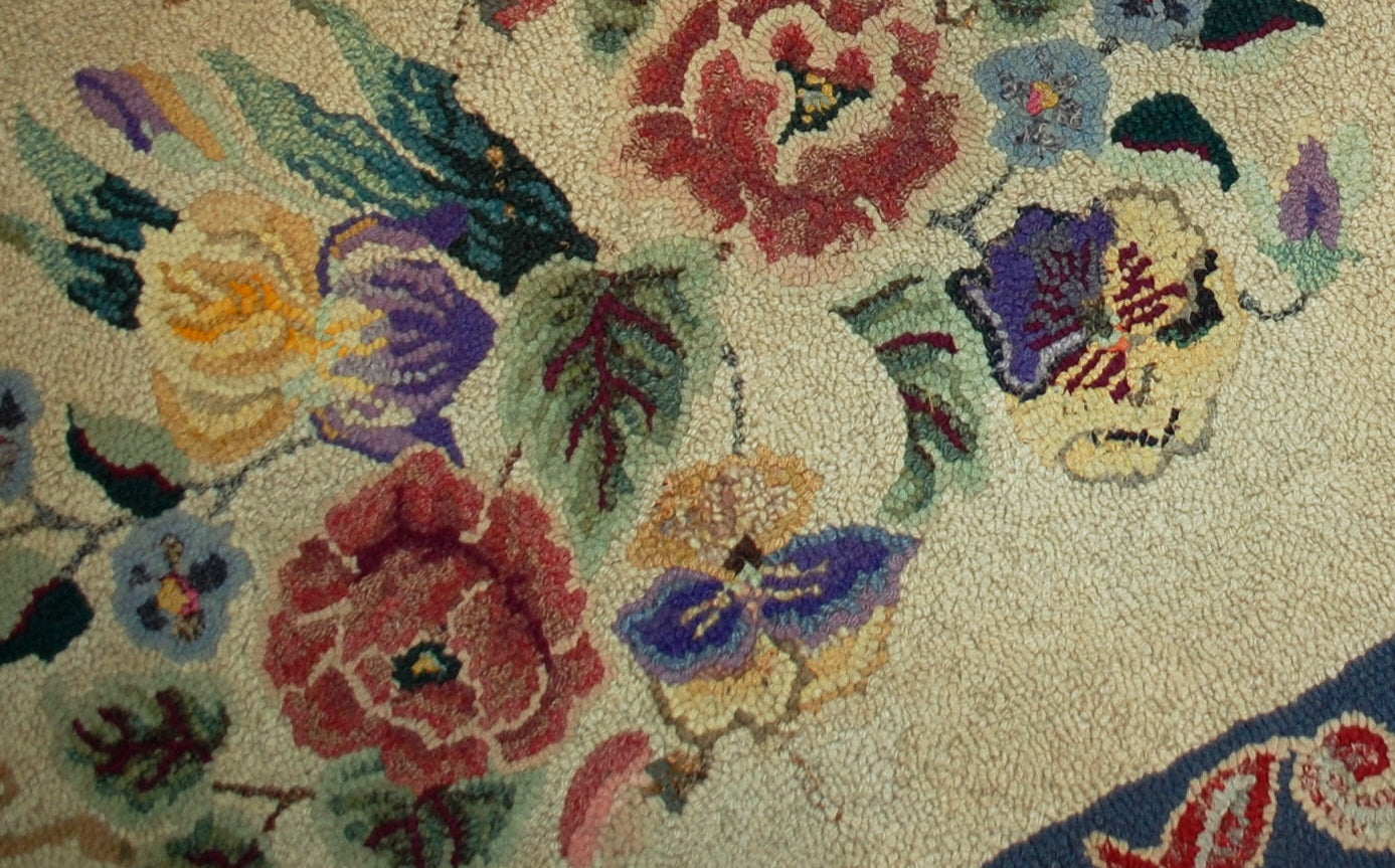 Hand made antique floral American hooked rug in original good condition. The rug made in floral design, the main shade is beige. 