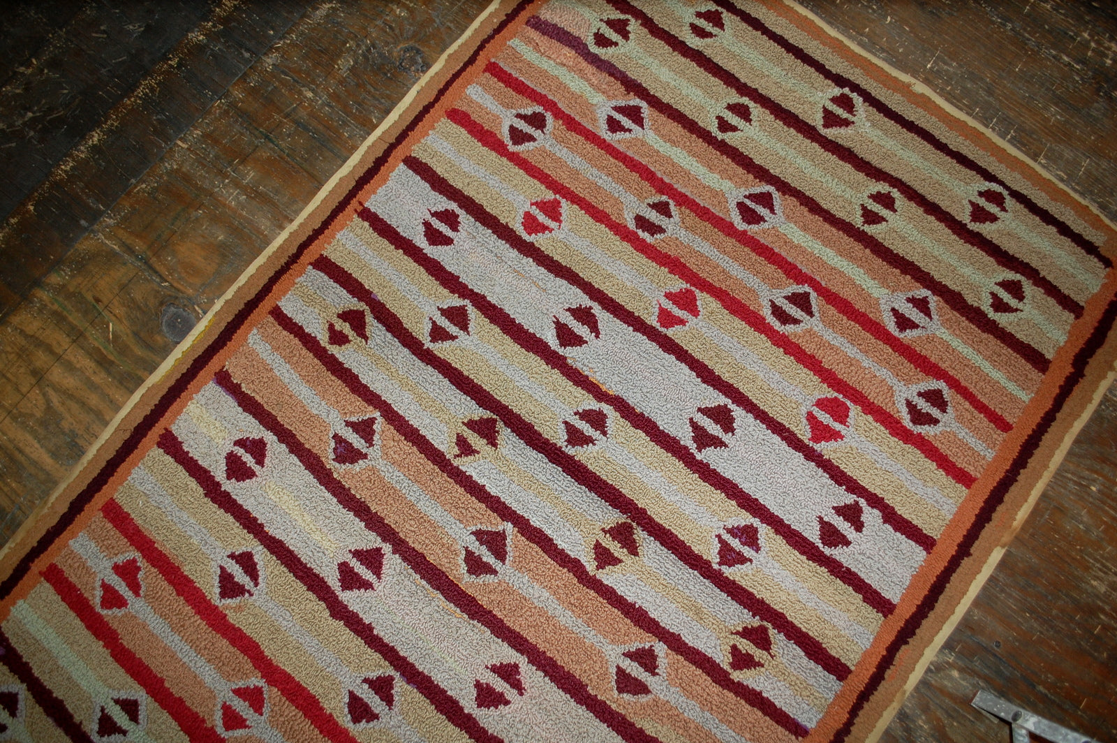 Handmade antique American hooked rug in original good condition. The rug has been made in geometric design in the end of 19th century. 