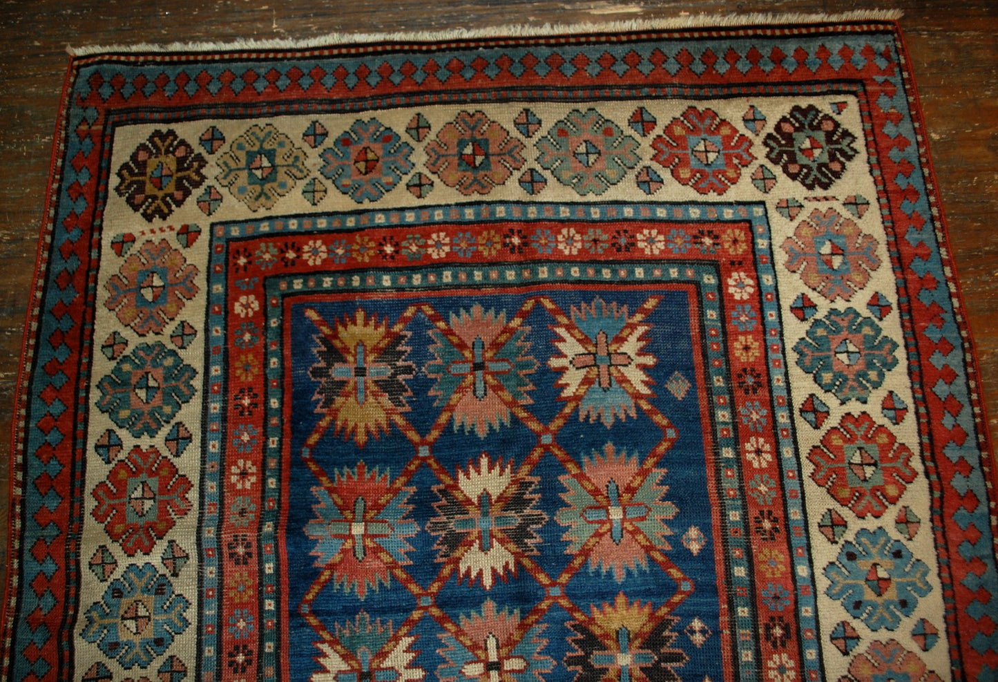 Antique handmade Caucasian Talish rug in good condition. The rug is in blue and white shades, made in the end of 19th century in Russia.