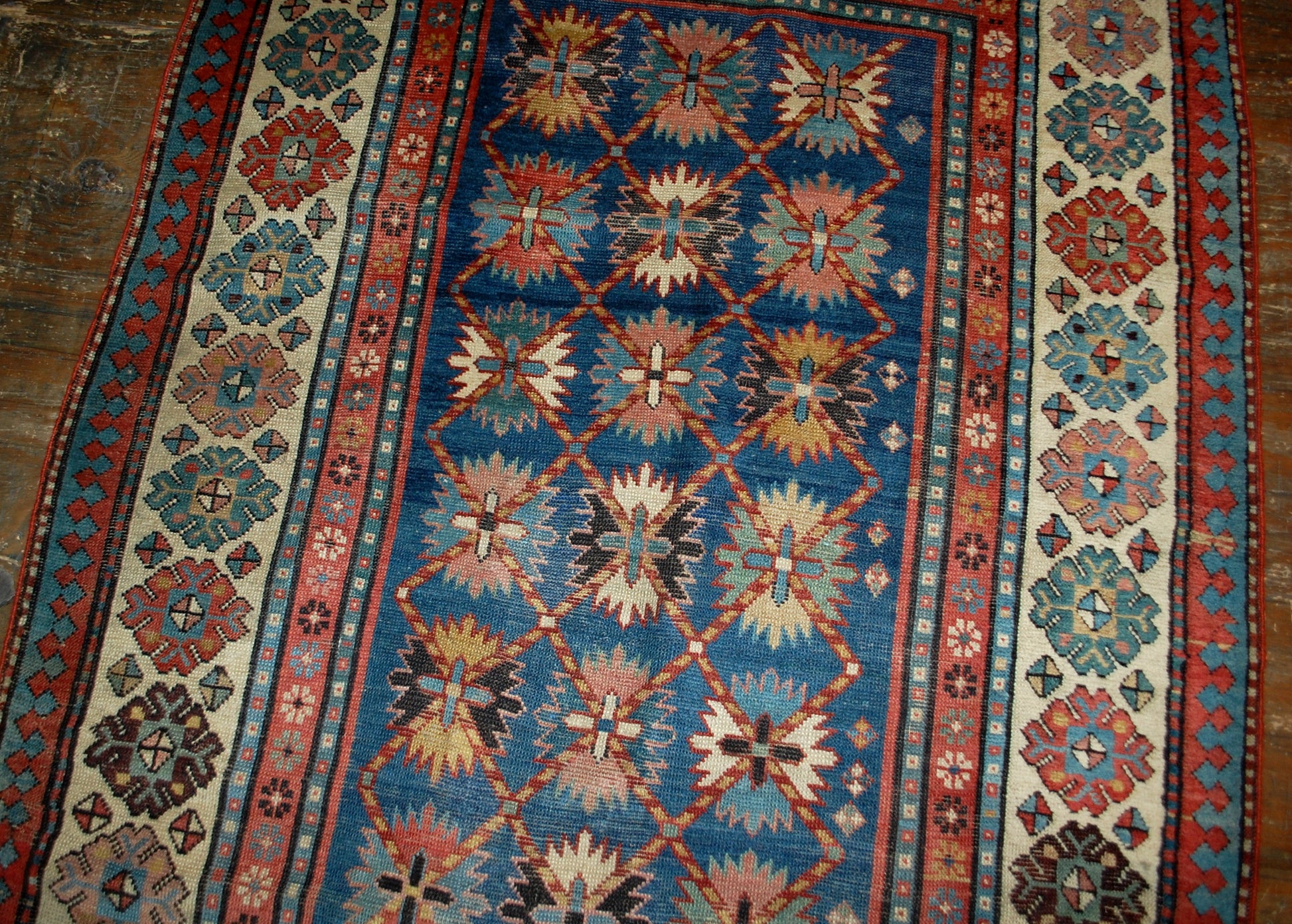 Antique handmade Caucasian Talish rug in good condition. The rug is in blue and white shades, made in the end of 19th century in Russia.