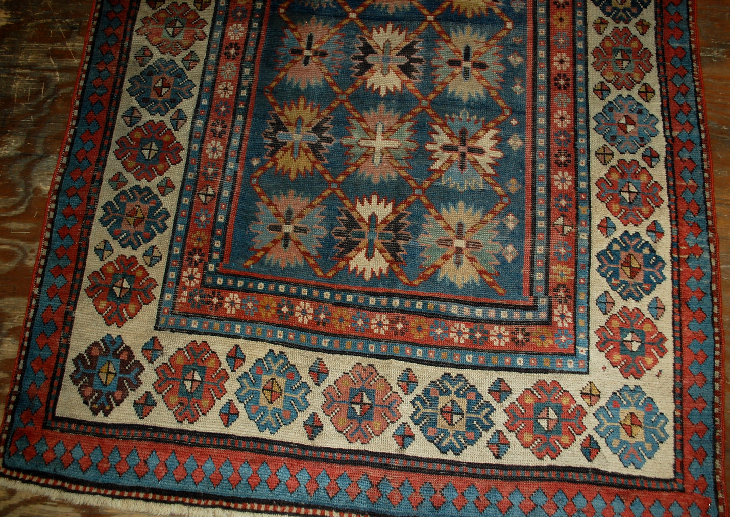 Antique handmade Caucasian Talish rug in good condition. The rug is in blue and white shades, made in the end of 19th century in Russia.