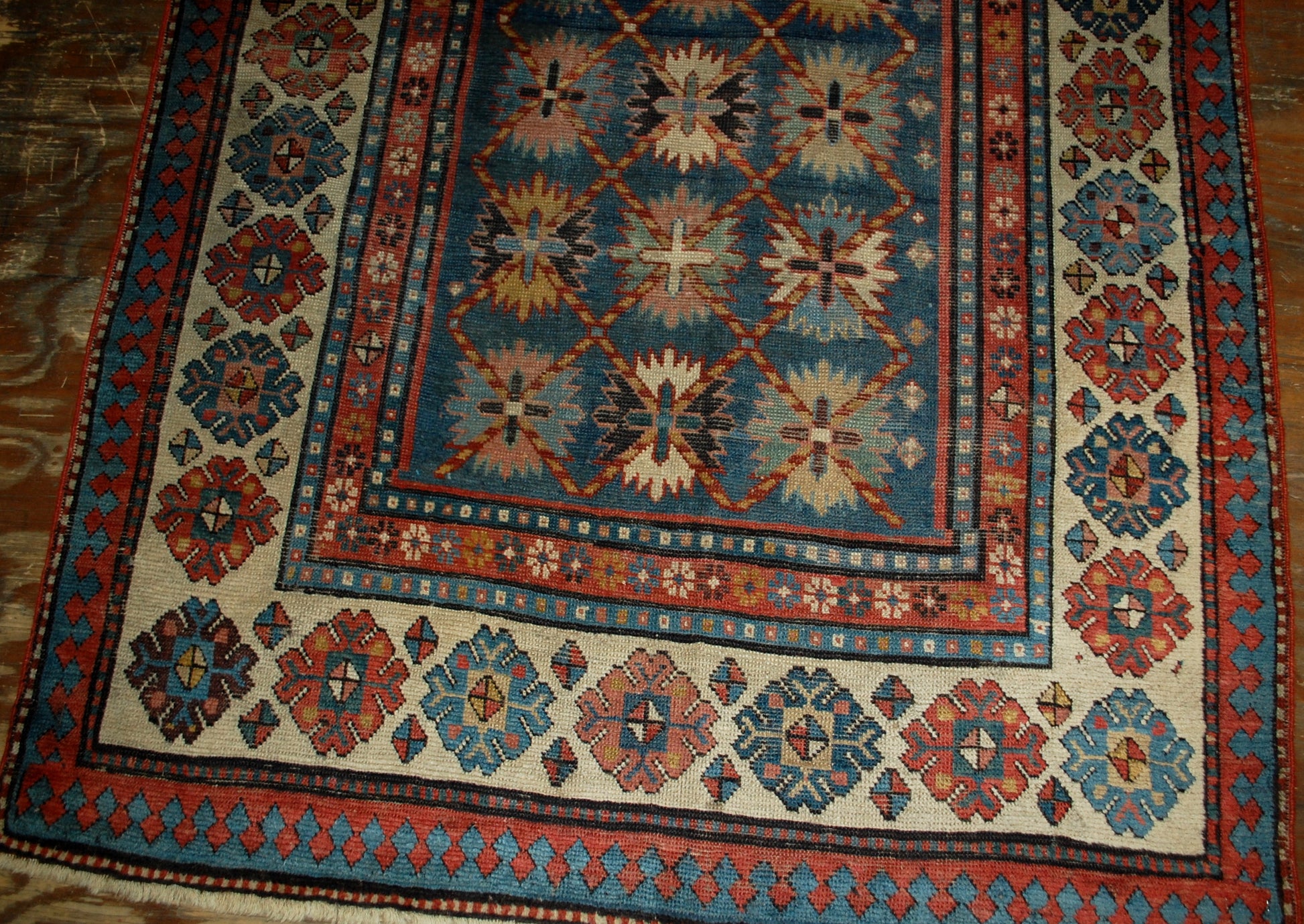 Antique handmade Caucasian Talish rug in good condition. The rug is in blue and white shades, made in the end of 19th century in Russia.
