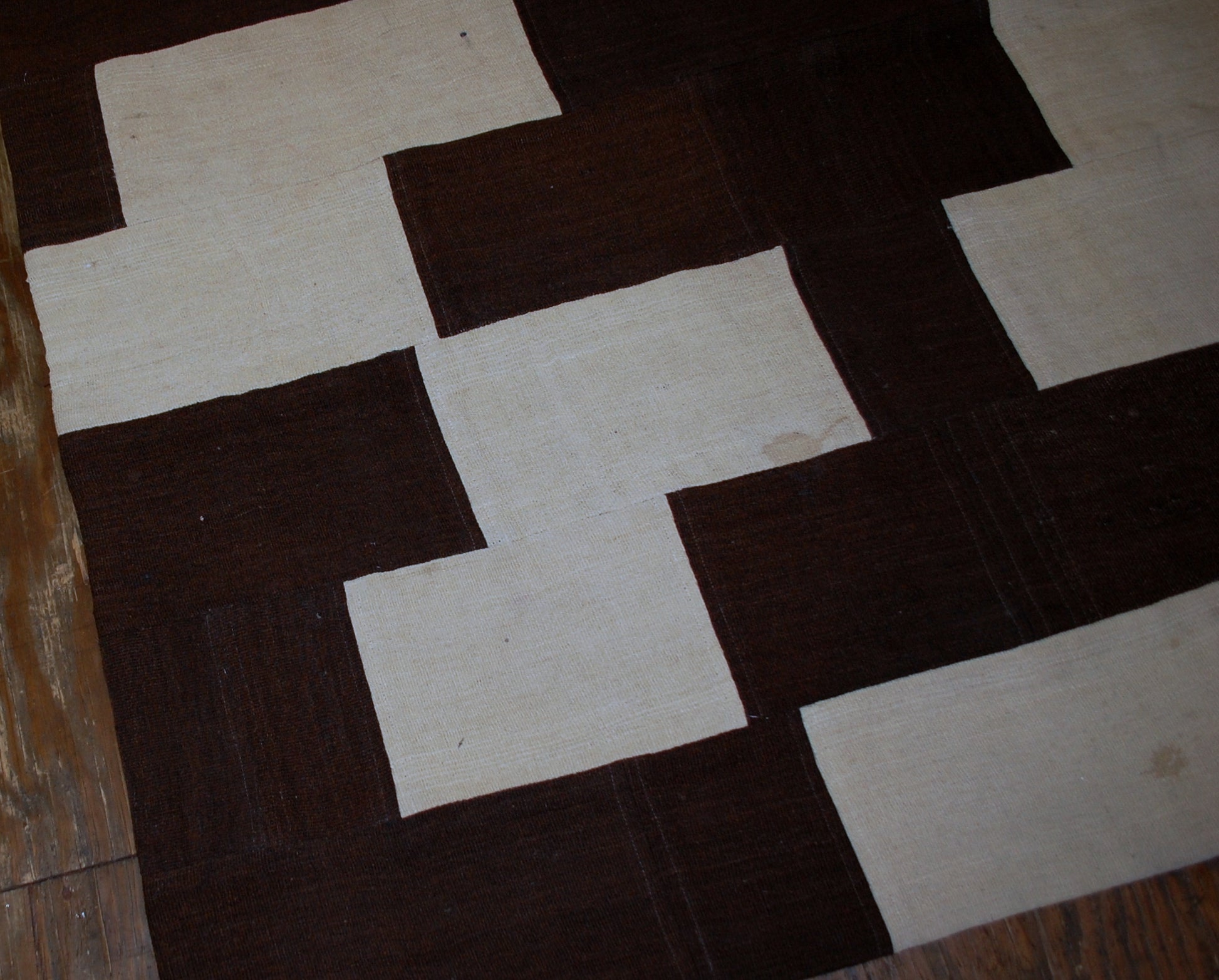 Handmade vintage Turkish kilim Patchwork in original good condition from the end of 20th century. This kilim made in white and chocolate brown wool.
