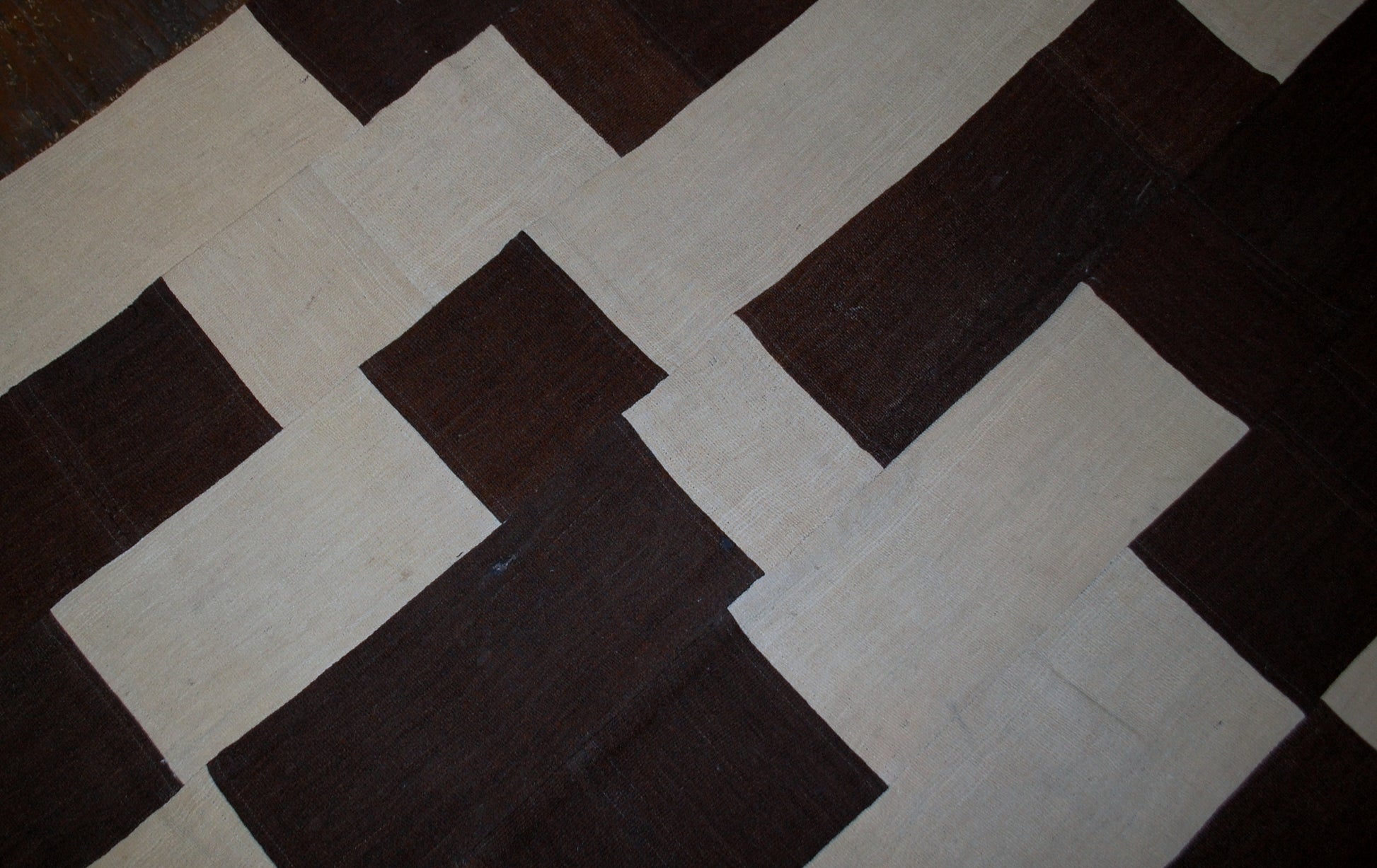 Handmade vintage Turkish kilim Patchwork in original good condition from the end of 20th century. This kilim made in white and chocolate brown wool.