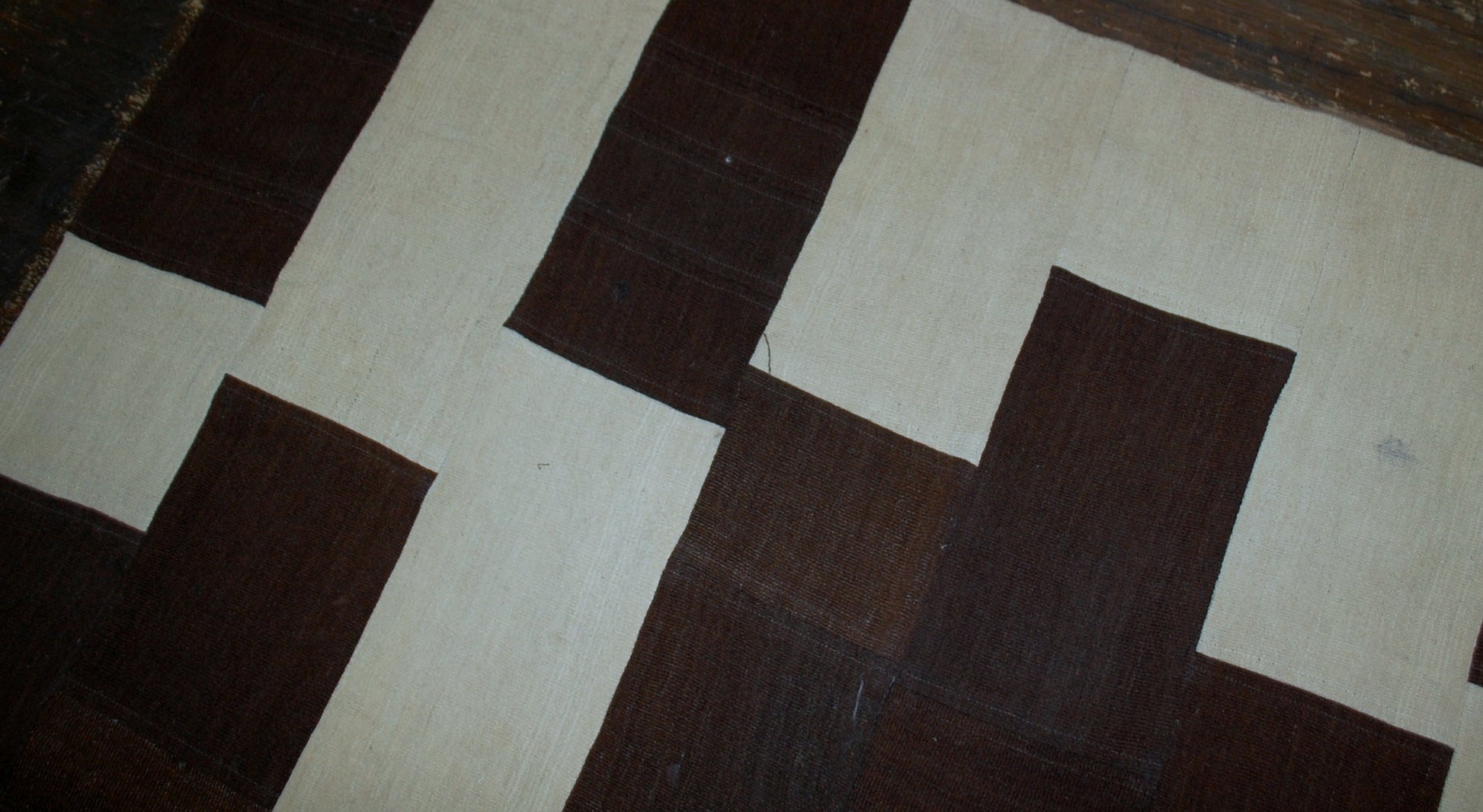 Handmade vintage Turkish kilim Patchwork in original good condition from the end of 20th century. This kilim made in white and chocolate brown wool.