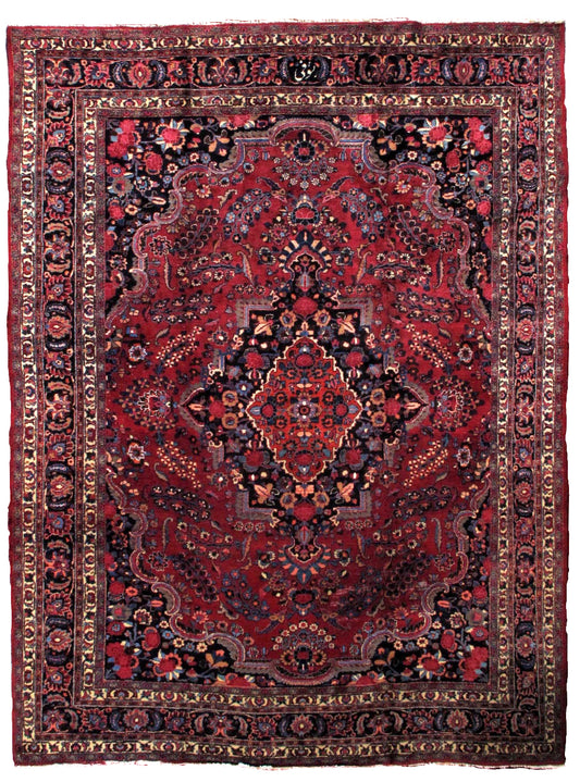 Handmade antique Persian Mashad rug 1910s