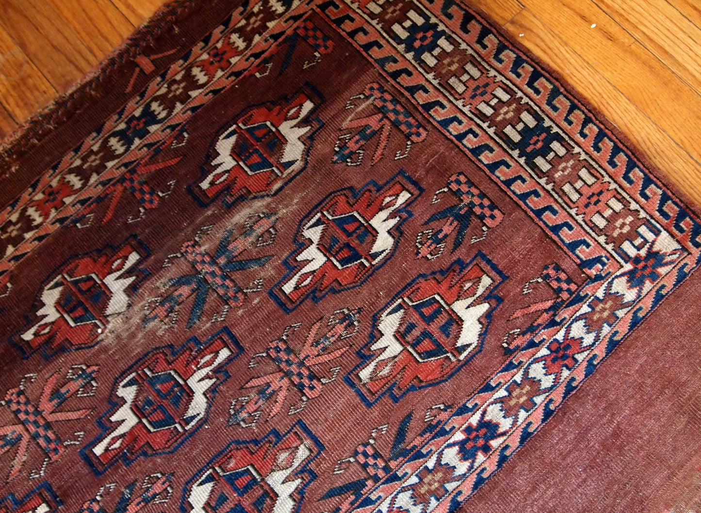 Handmade antique collectible Turkmen Yomud rug in original condition with some signs of age. 