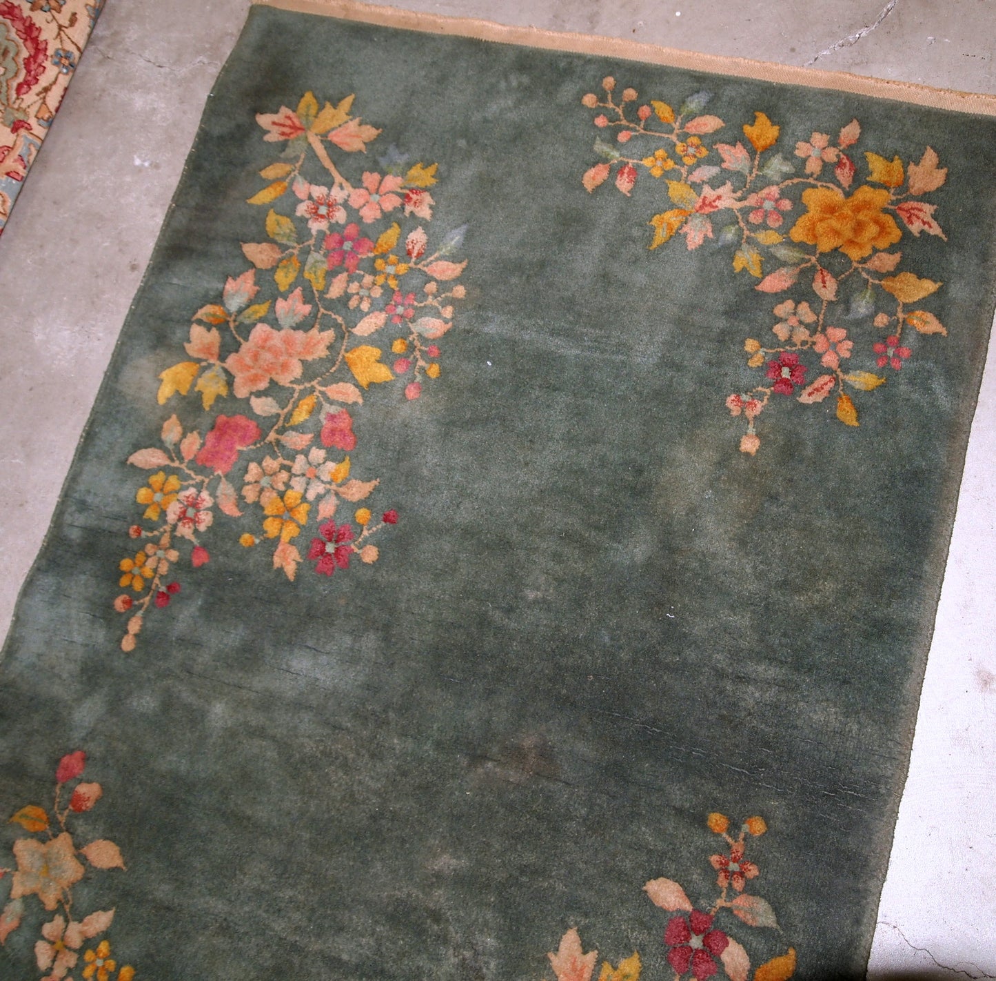 Antique Art Deco rug from the beginning of 20th century in green shade. The rug has some age discolorations ( the does not shows much). 
