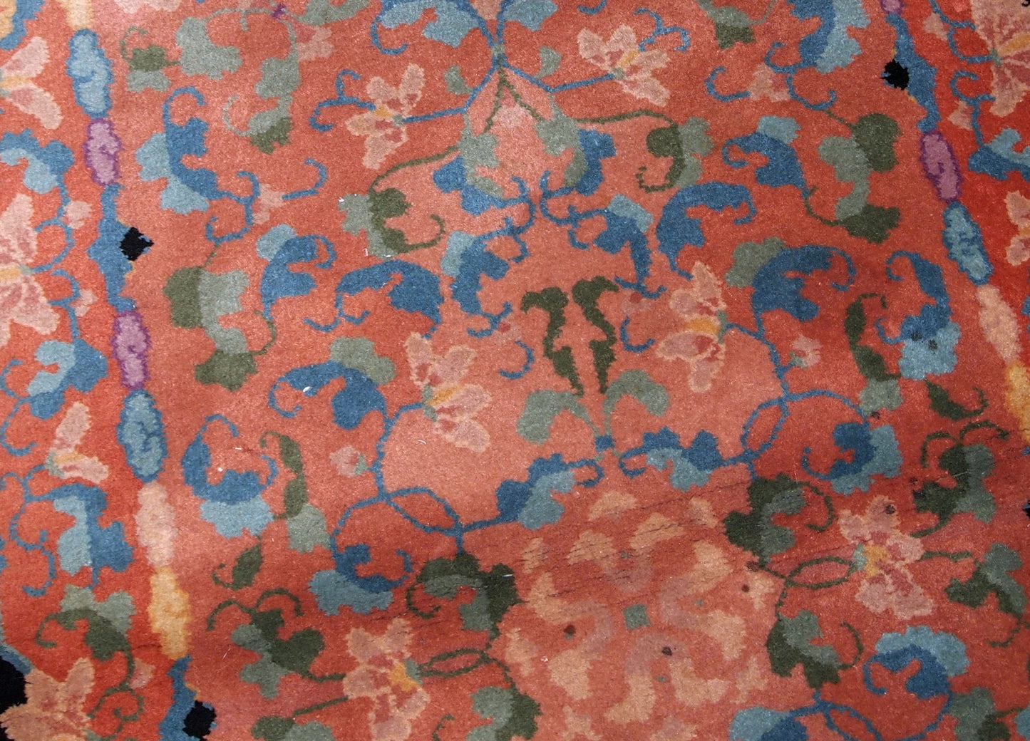 Antique Art Deco Chinese rug in unusual abstract design in  peach, sky blue, purple and egg shell shades. The rug is in original good condition.