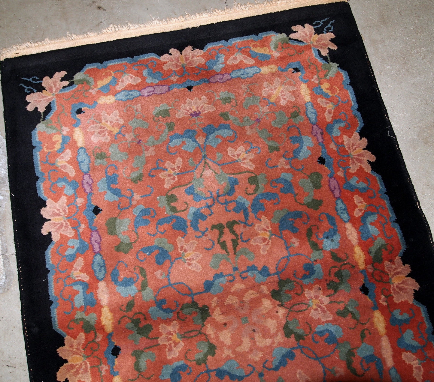 Antique Art Deco Chinese rug in unusual abstract design in  peach, sky blue, purple and egg shell shades. The rug is in original good condition.