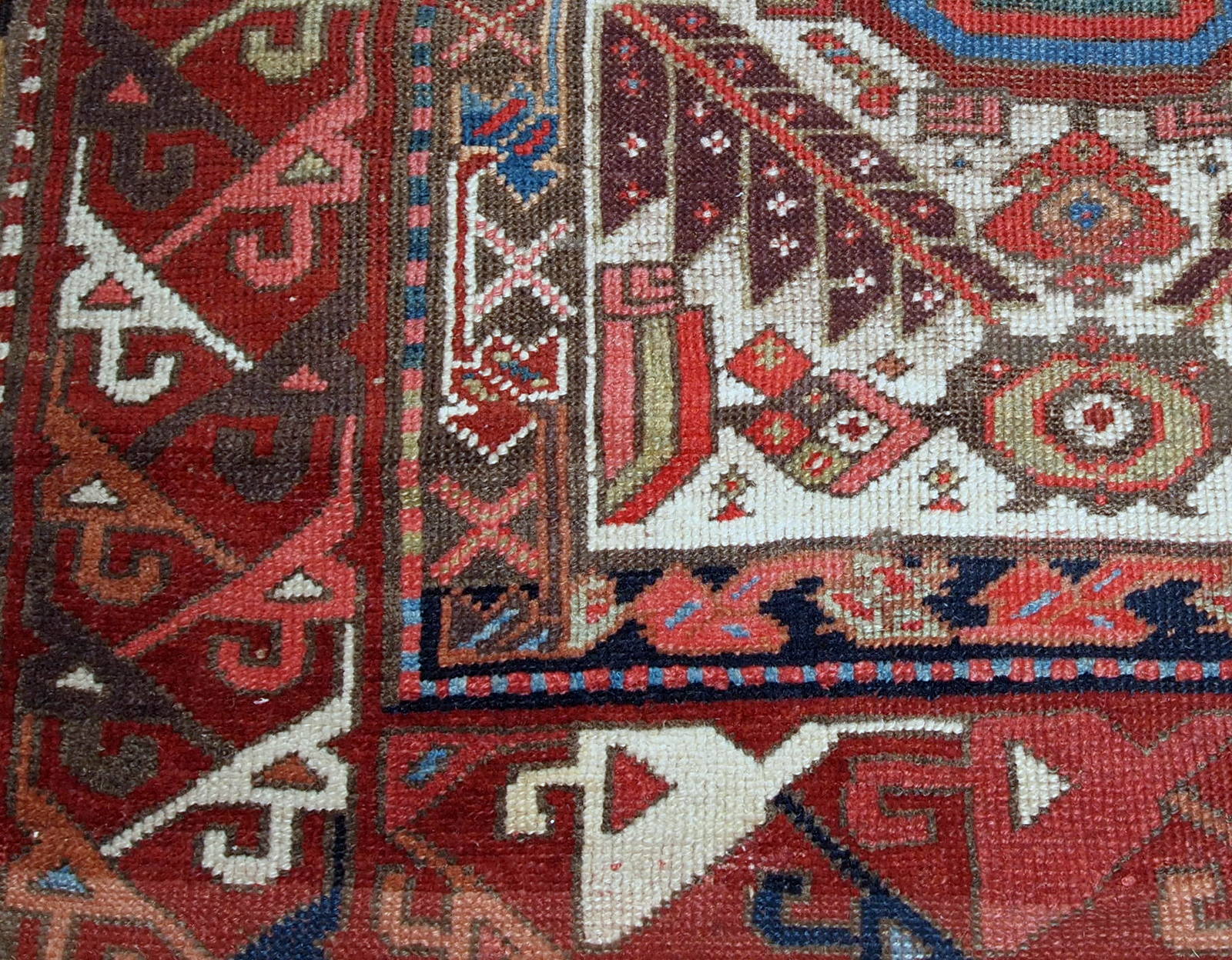 Hand made antique collectible Northwest Persian runner in original good condition. This rug is from the middle of 19th century in white, burgundy, blue and yellow shades.