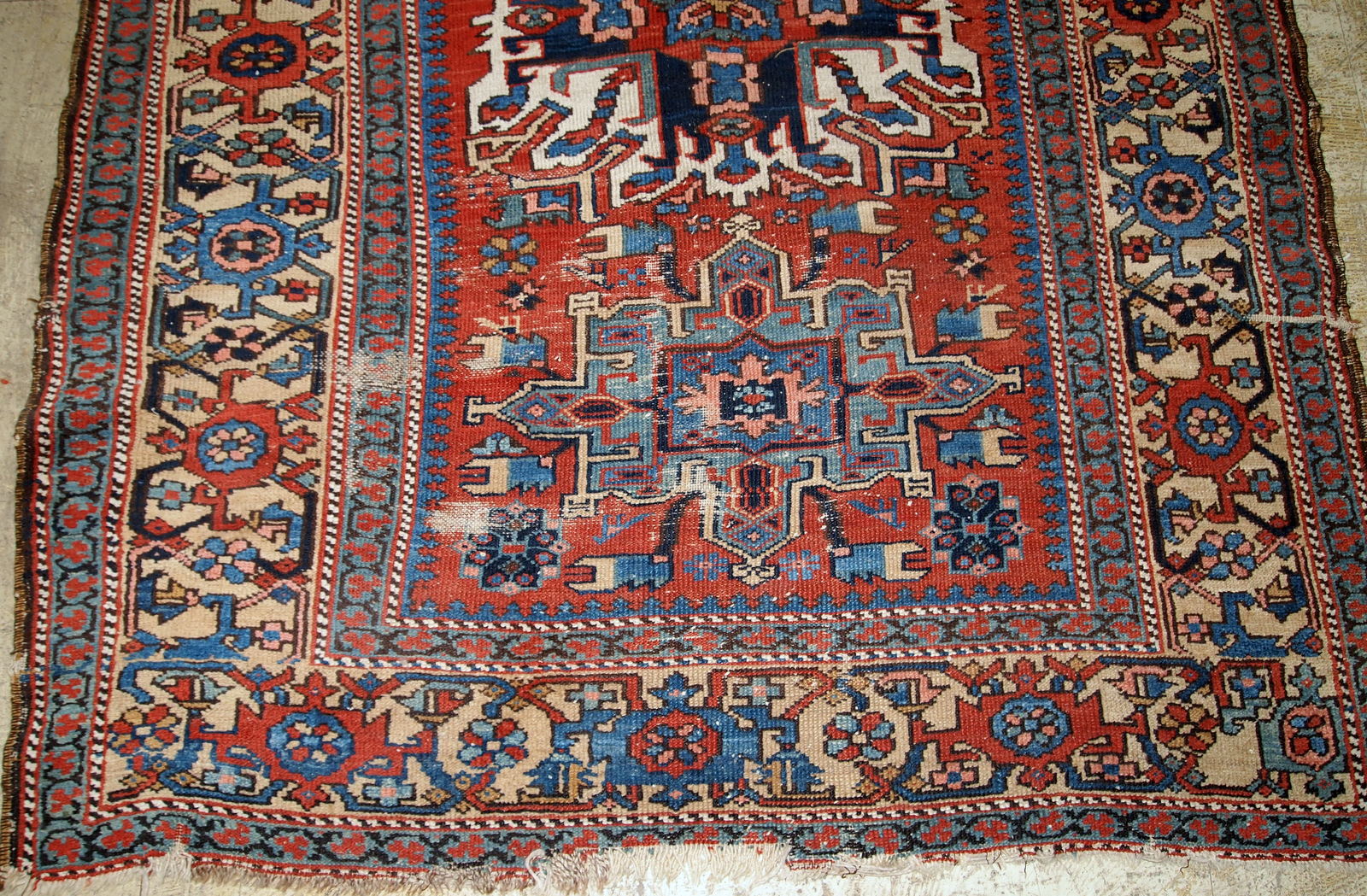 Handmade antique Persian Heriz distressed rug 1890s
