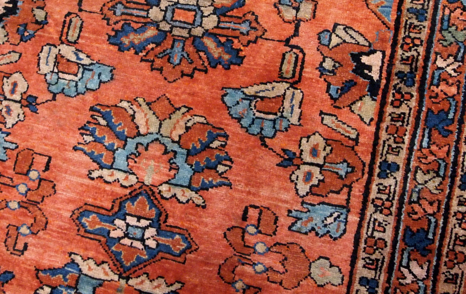 Antique hand made Persian Lilihan rug in original good condition. The rug is from the beginning of 20th century, in red shade.