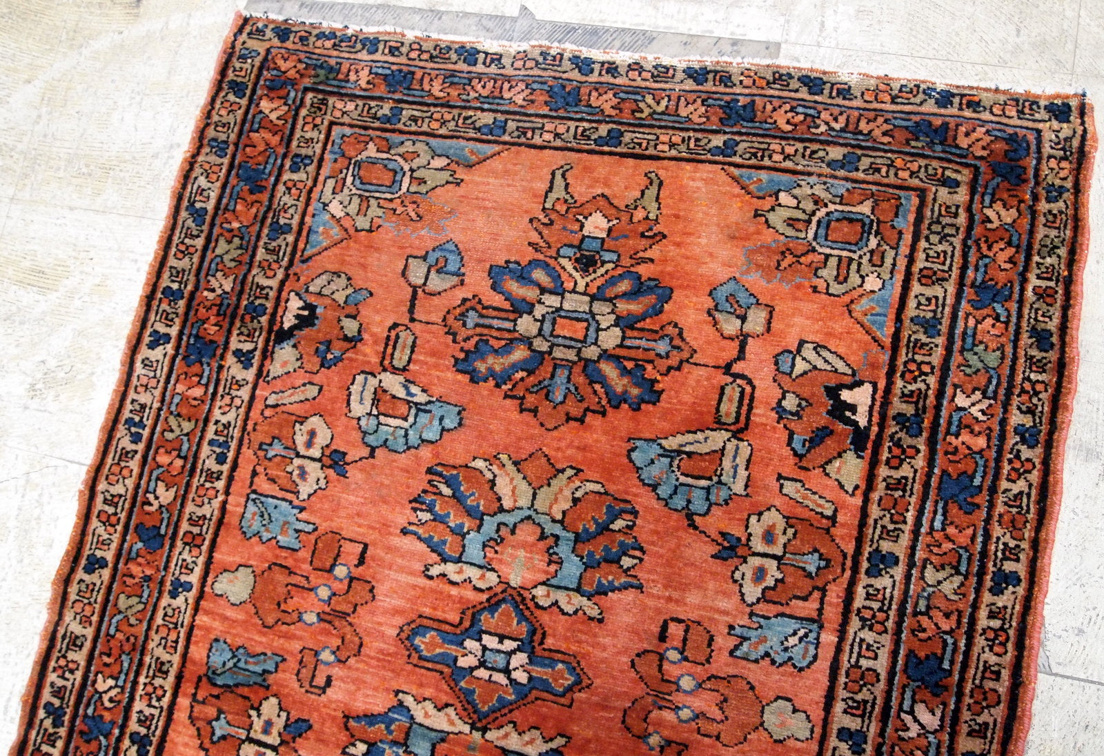 Antique hand made Persian Lilihan rug in original good condition. The rug is from the beginning of 20th century, in red shade.