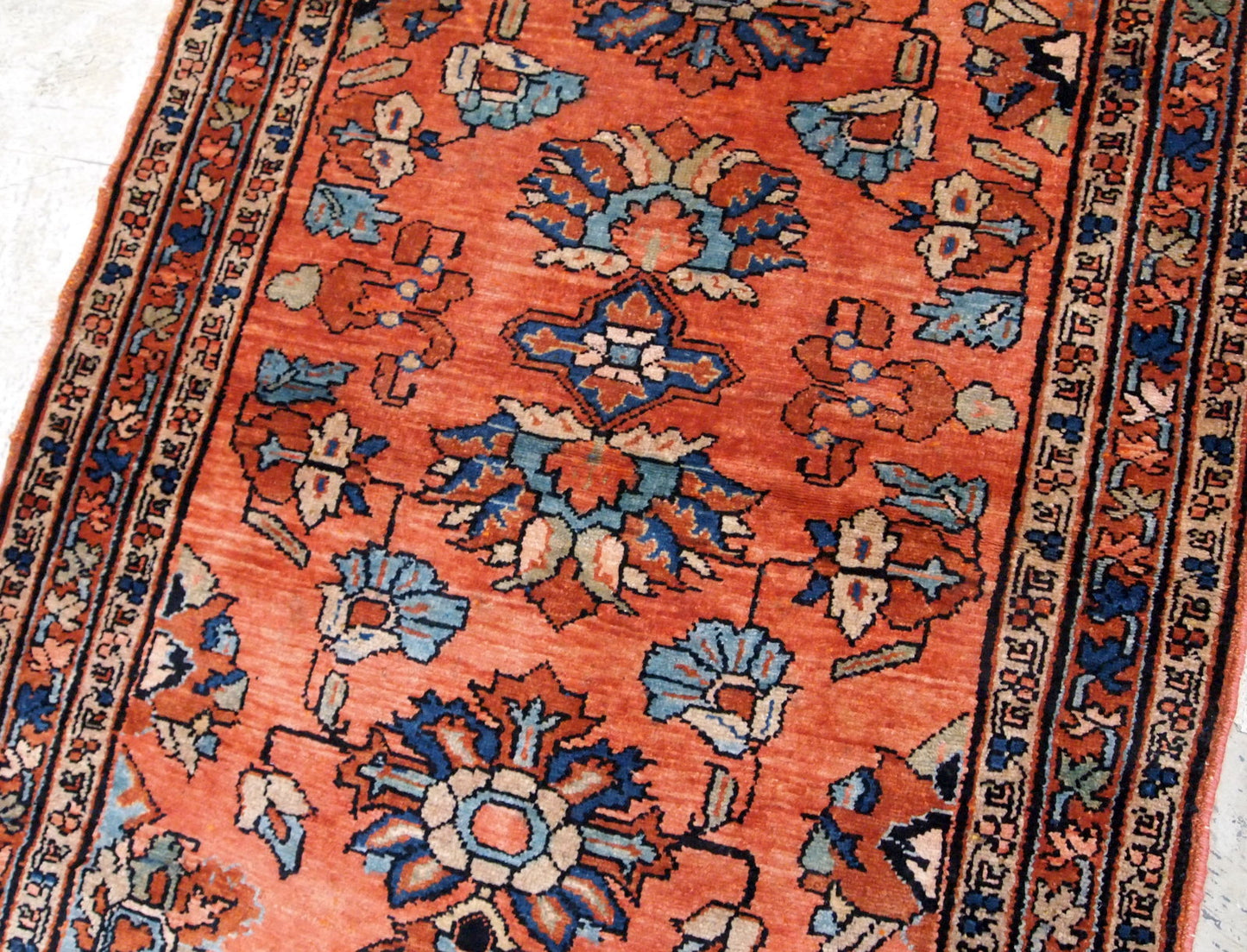 Antique hand made Persian Lilihan rug in original good condition. The rug is from the beginning of 20th century, in red shade.