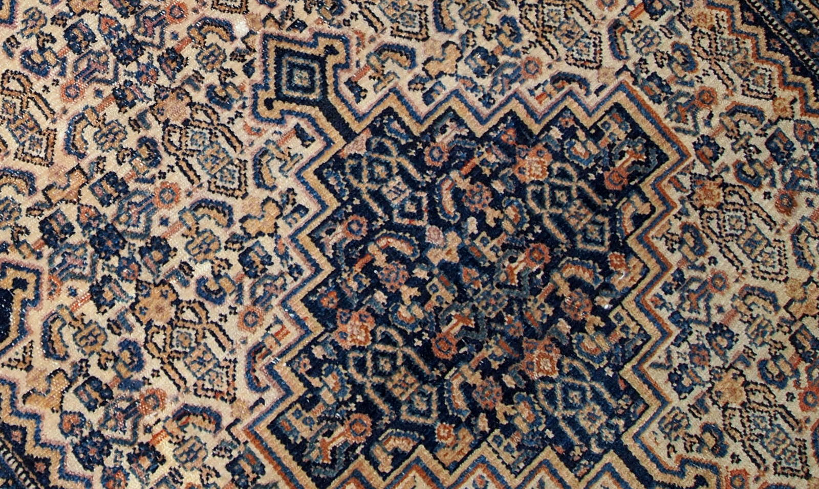 Antique Bibikabab rug in beige and navy blue shades. The rug is from the beginning of 20th century in original good condition. 