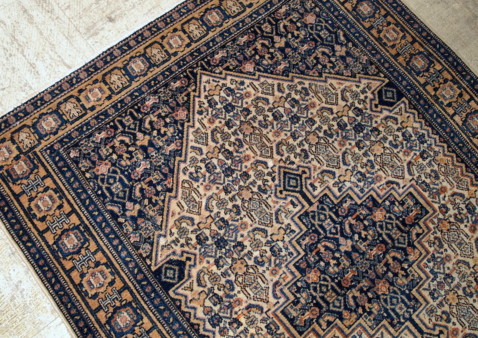 Antique Bibikabab rug in beige and navy blue shades. The rug is from the beginning of 20th century in original good condition. 