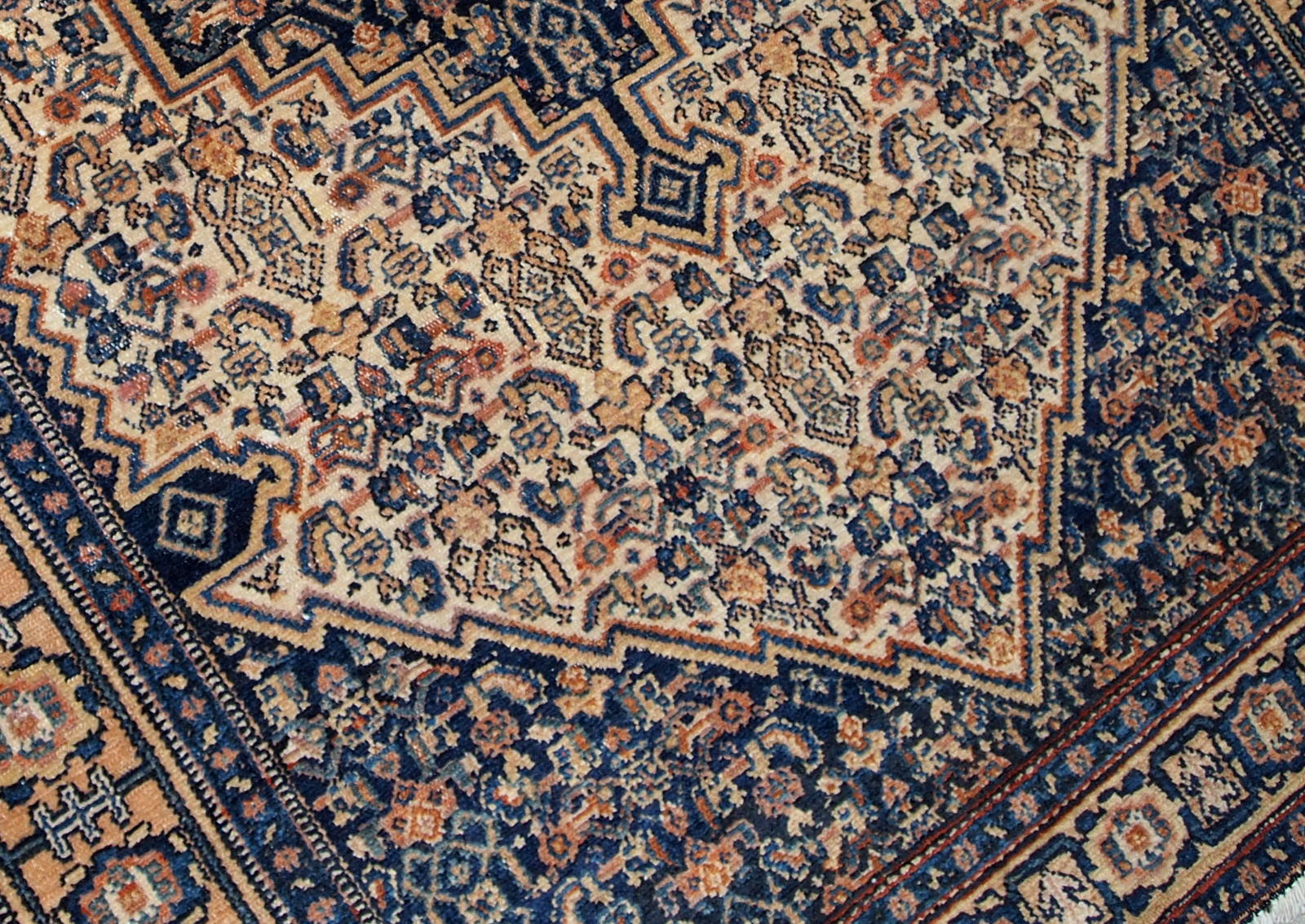 Antique Bibikabab rug in beige and navy blue shades. The rug is from the beginning of 20th century in original good condition. 