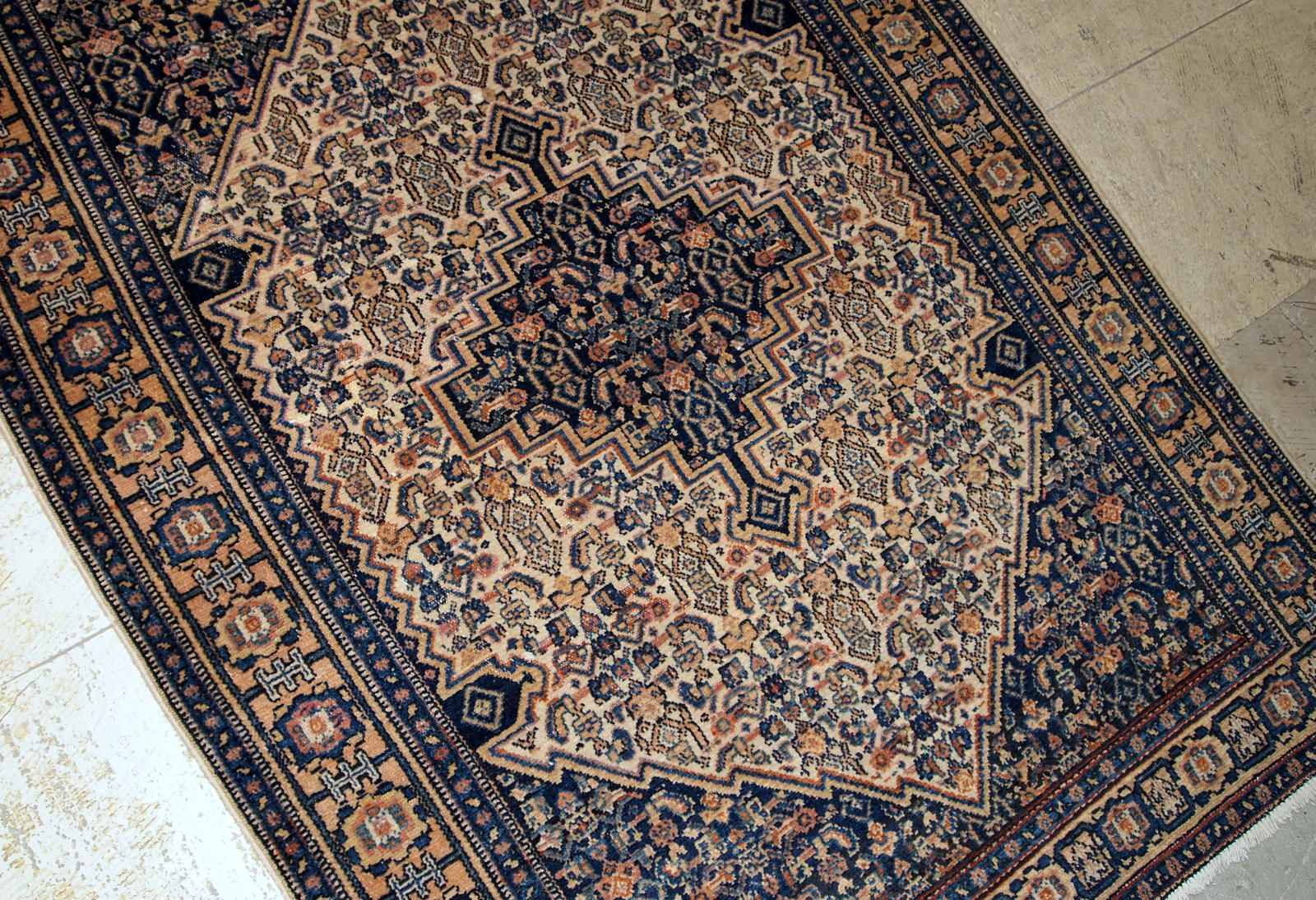 Antique Bibikabab rug in beige and navy blue shades. The rug is from the beginning of 20th century in original good condition. 