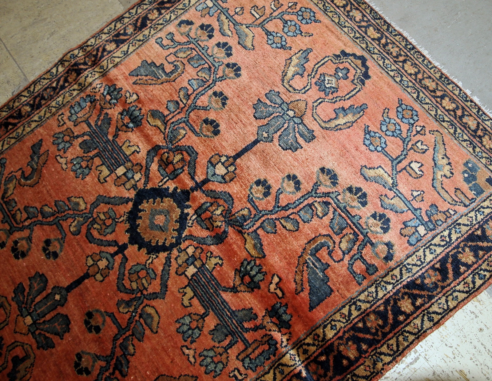Antique hand made Lilihan rug in red shade with geometric/floral design. The rug is in original good condition from 1920s.